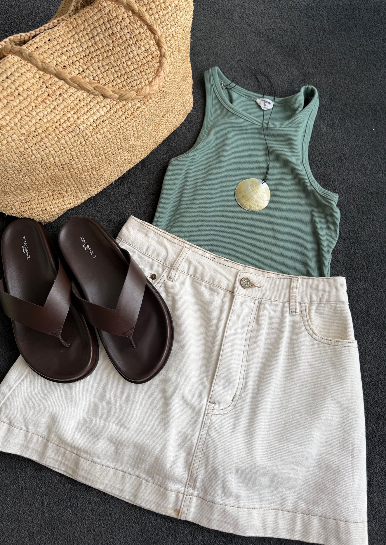 Summer Holiday Packing 🌺☀️
Tank: Cotton On
Skirt: DISSH 
Sandals: Tony Bianco (I sized up)
Bag: Massimo Duttie 
Necklace: Nuri Studios, dupes linked 

#LTKaustralia #LTKsummer