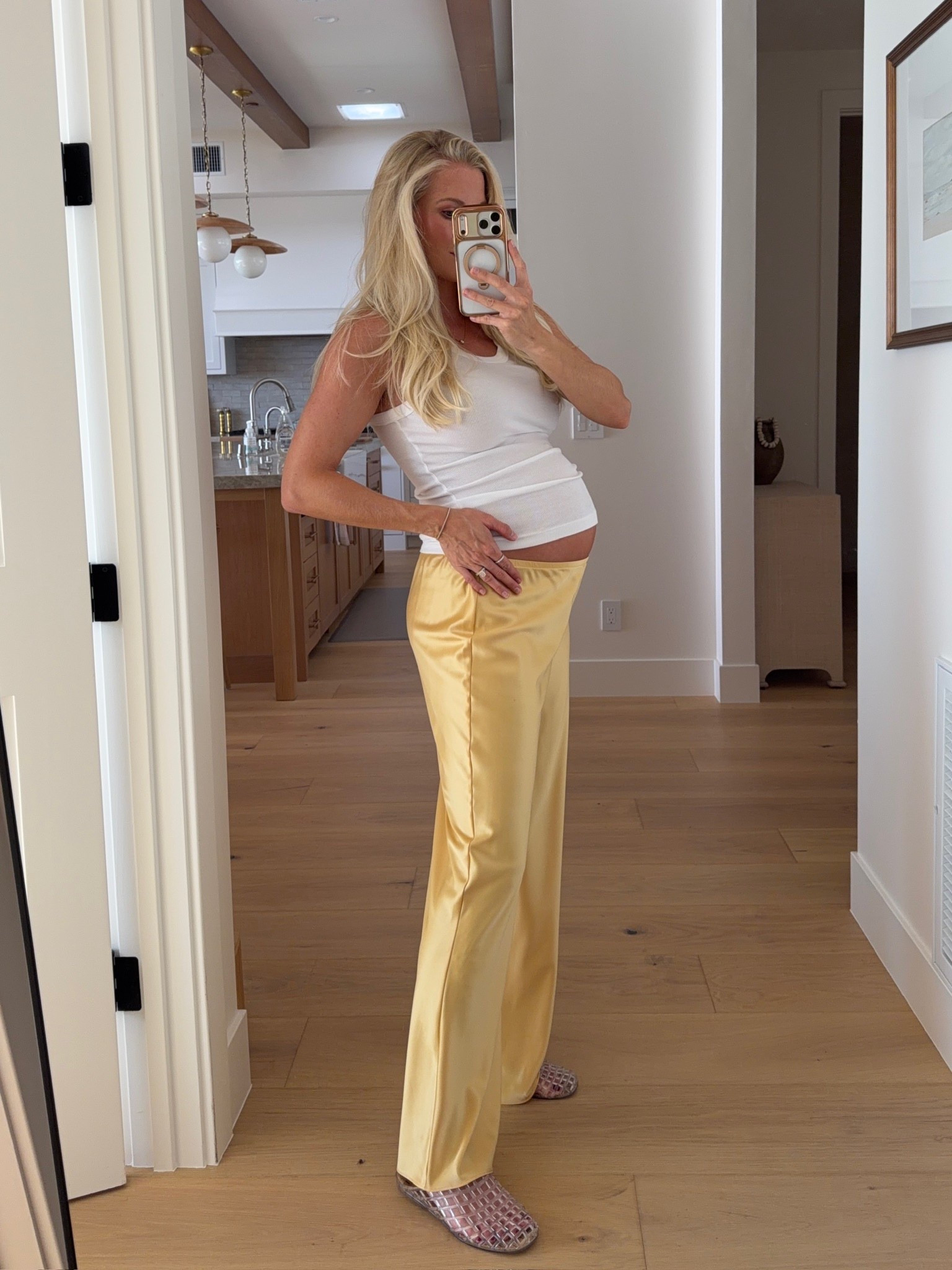 Wearing a medium in tank (sized up for pregnancy), medium petite in pants (sized up for pregnancy, got petite to wearing under belly), shoes are tts, code “KPGS20!” for discount on jewelry! #kathleenpost

Spring transition outfit, spring outfits 2026, casual chic outfit, farmers market look, casual lunch fit, errands outfit, bump friendly, maternity look

#LTKootd #LTKBump #LTKSeasonal