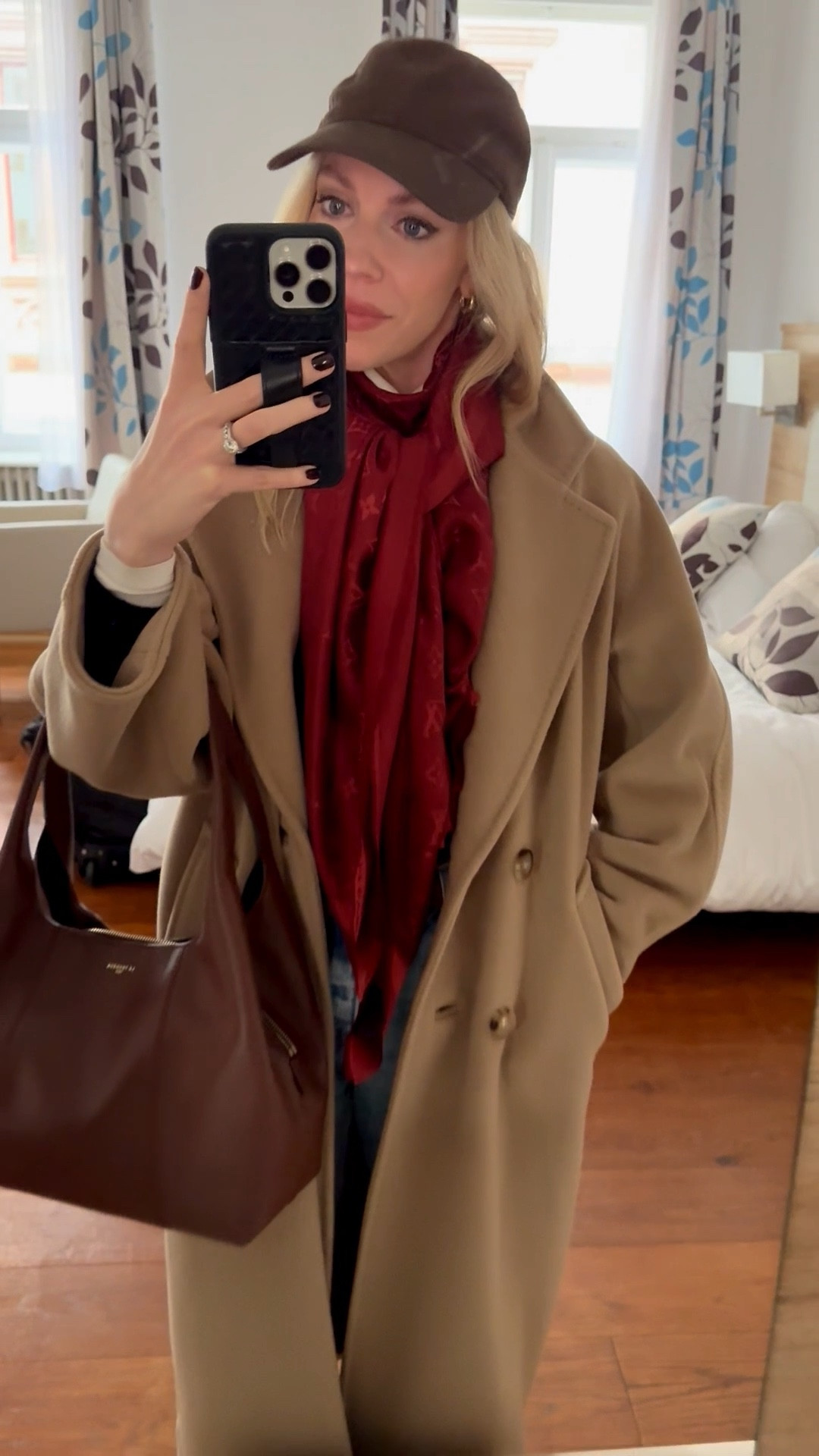 Casual chic travel look, camel coat, red Louis Vuitton scarf, @Zara brown baseball cap, dark brown Le Tanneur handbag @Levi's baggy 90’s jeans 

#LTKSaleAlert #LTKTravel #LTKSeasonal