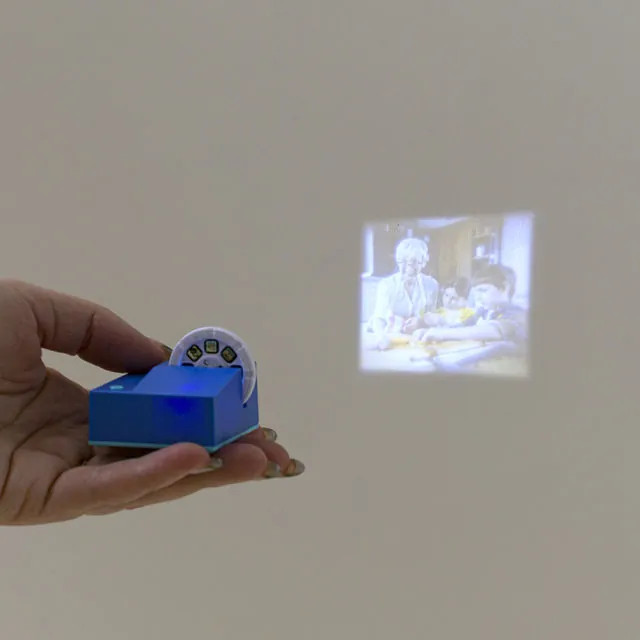 Mini Projector with Custom Photo Reel | UncommonGoods