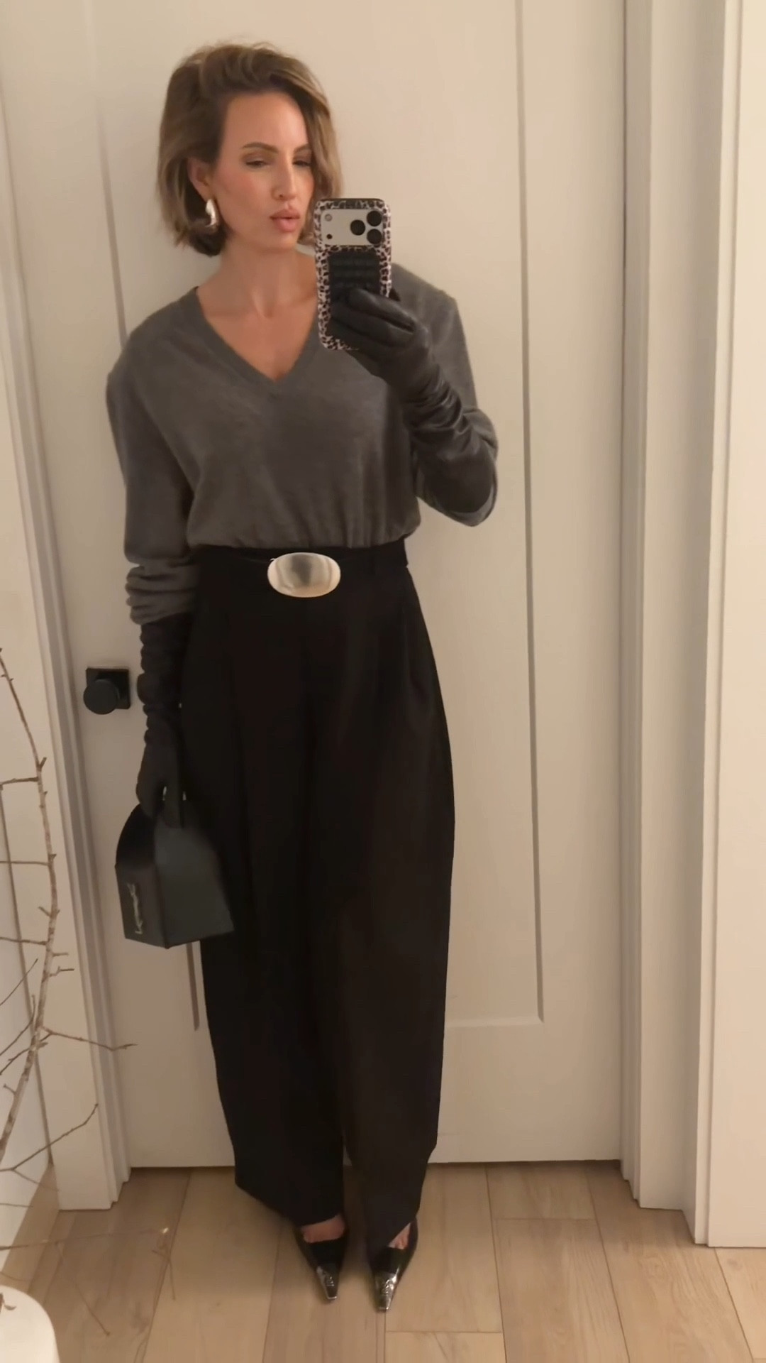 I love an exaggerated barrel pant with a shoulder pad top! And then a cinched in waist with a belt. It’s like my dream outfit. Anyway, these pants run to size. I’m fully aware that they are very expensive. I linked to similar looking ones that give very similar vibes below! Also, I loved this top so much (I have it in olive), I bought it in this gray. Wearing a small.

#LTKHoliday #LTKItBag #LTKShoeCrush