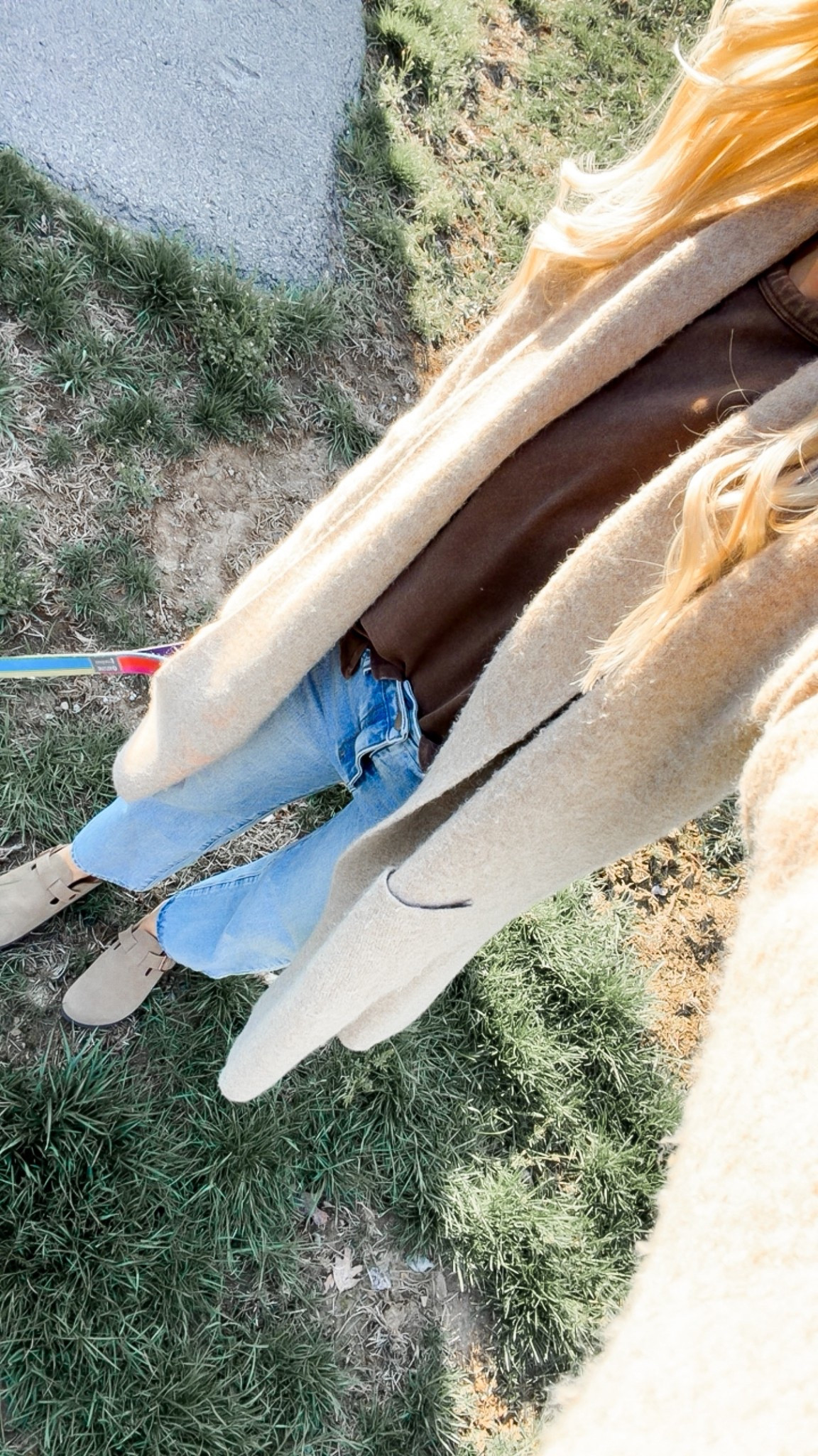 What I’m wearing today! Today’s OOTD for school drop off, errands, and playing outside! Loving the 90s mom vibe! Can’t go wrong with a long length cardigan, oversized tee, and a good pair of straight leg jeans! Loving these clogs too! ￼

#LTKgrwm #LTKdayinmylife #LTKootd