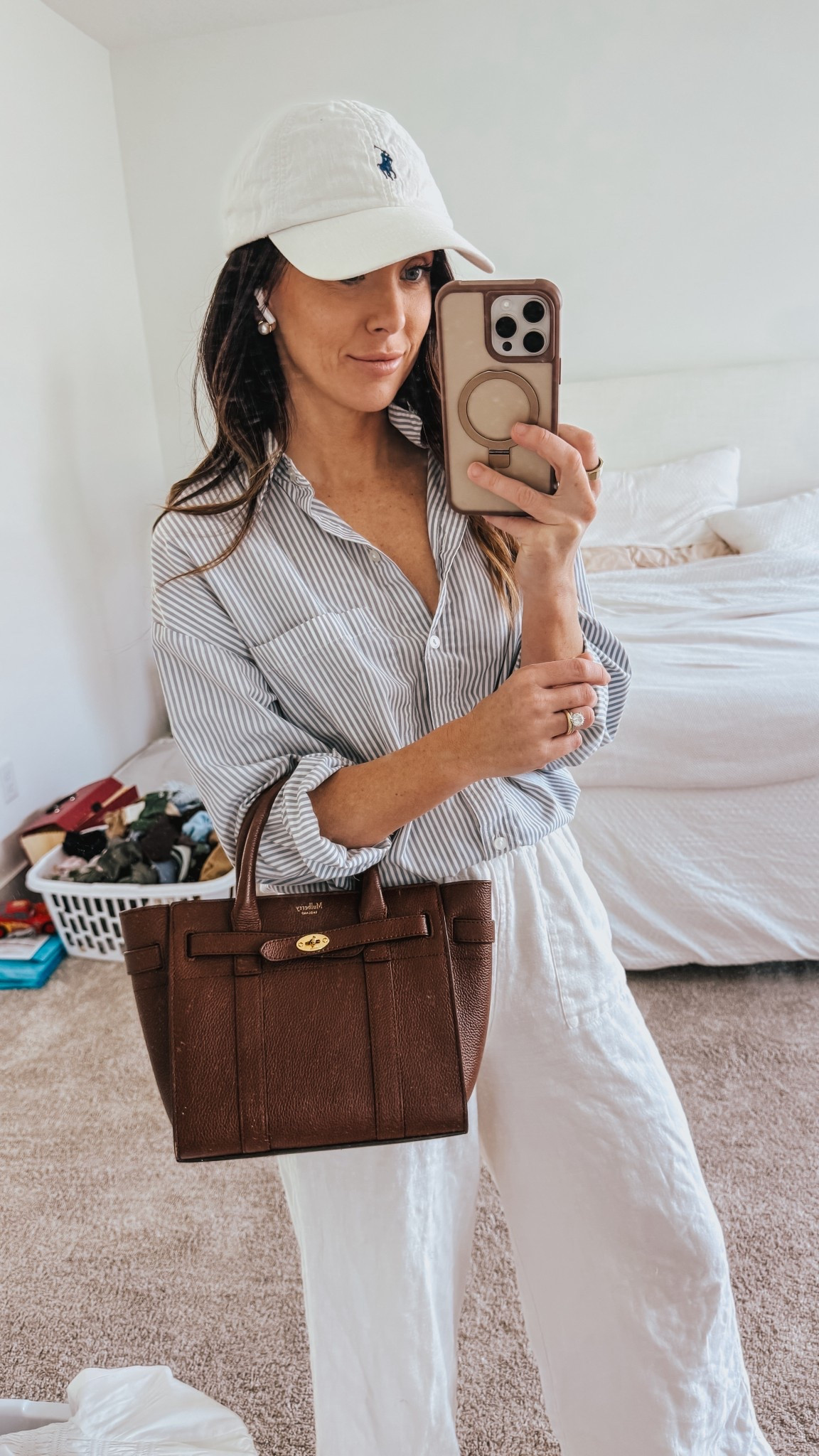 My top is originally A&F from 2021 but the one I linked is SO GOOD. Haven’t seen one this similar to mine since I bought it.
.
Linen pants, linen, striped button up, polo hat, polo cap

#LTKOver40