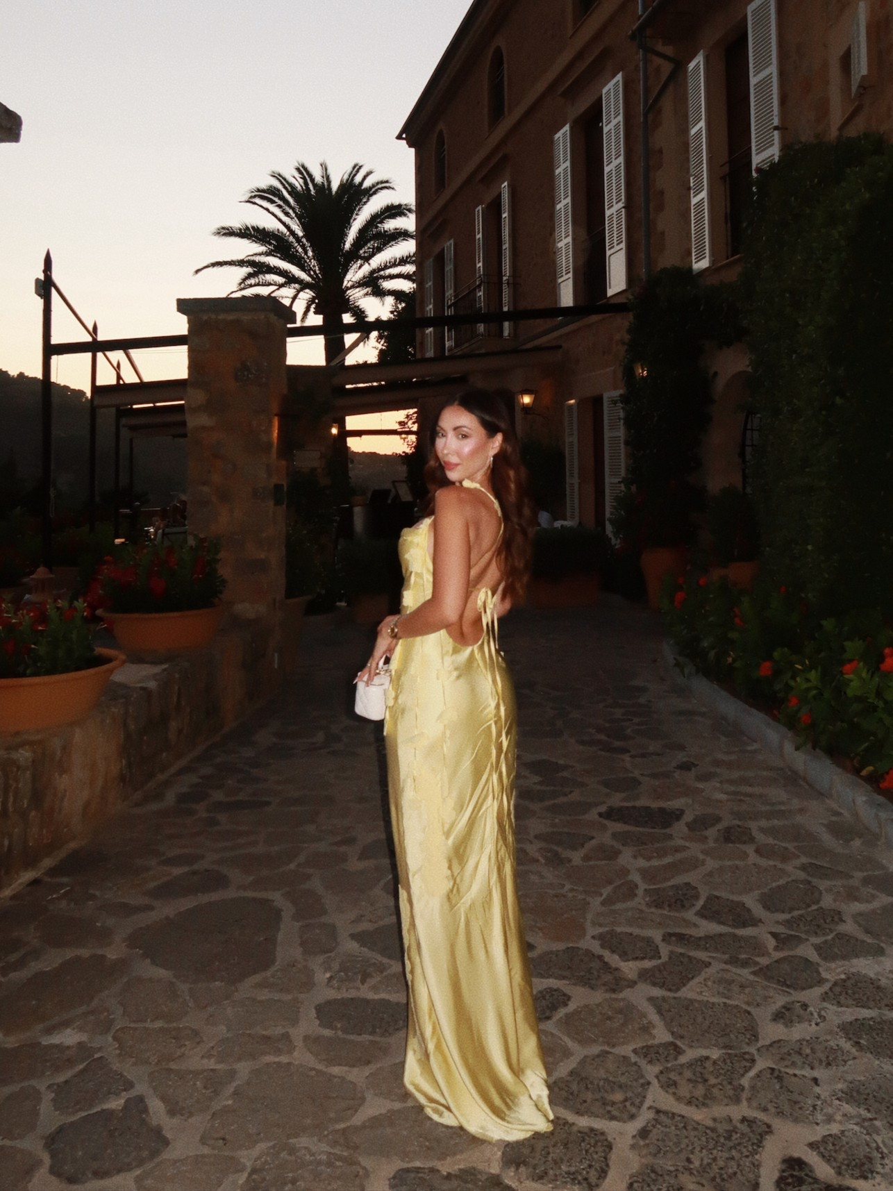 The most stunning yellow dress for a night out in Mallorca 💛

#LTKWedding #LTKStyleTip #LTKTravel