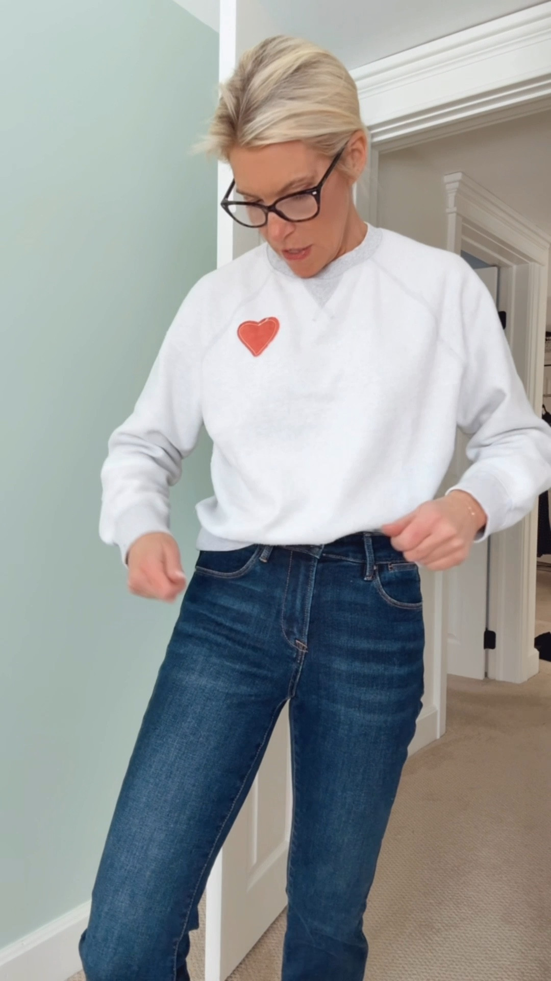 Cutest little grey sweatshirt with a red heart. Perfect valentines outfit. Paired with brown suede slid loafers and straight leg dark jeans ❤️

#LTKootd #LTKValentine #LTKOver40