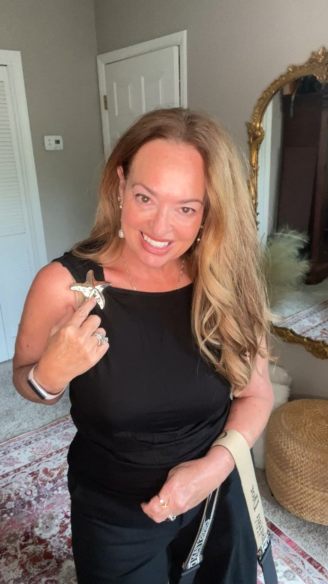 Starfish gold clasp detail on black tank. A super versatile item that will instantly elevate your summer style .

#LTKOver40 #LTKootd #LTKTravel