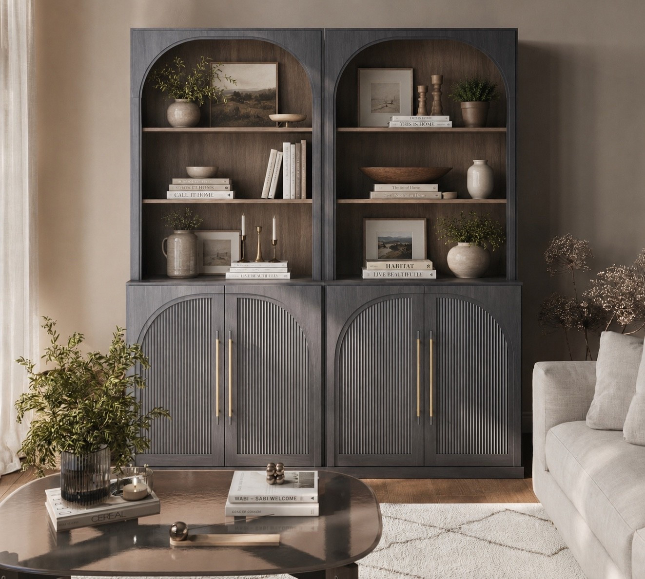 This set of 2 storage cabinet bookcases are so pretty. I love the arched detail on them. They look so rich. ￼

#LTKHome
