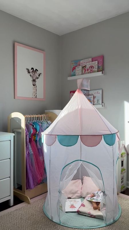 Girls pop-up castle tent for only $29! Selling out - only 5 left in stock!! We love this toy because it folds down into a small bag for storage and even when it is opened, it doesn’t take up a lot of space. Excellent quality, we’ve had for a year and Millie absolutely loves it! Encourages creative and imaginative play. Would make the perfect Christmas gift for kids under $30. 

The kids wardrobe organizer and dollhouse have also been big hits in our home. Again, excellent quality and provide tons of opportunities for kids to play. They both ship for free! 

Target find, toddler gift ideas, toddler girl’s room, gifts for girls, little girl holiday gifts, affordable 

#LTKfindsunder50 #LTKGiftGuide #LTKkids
