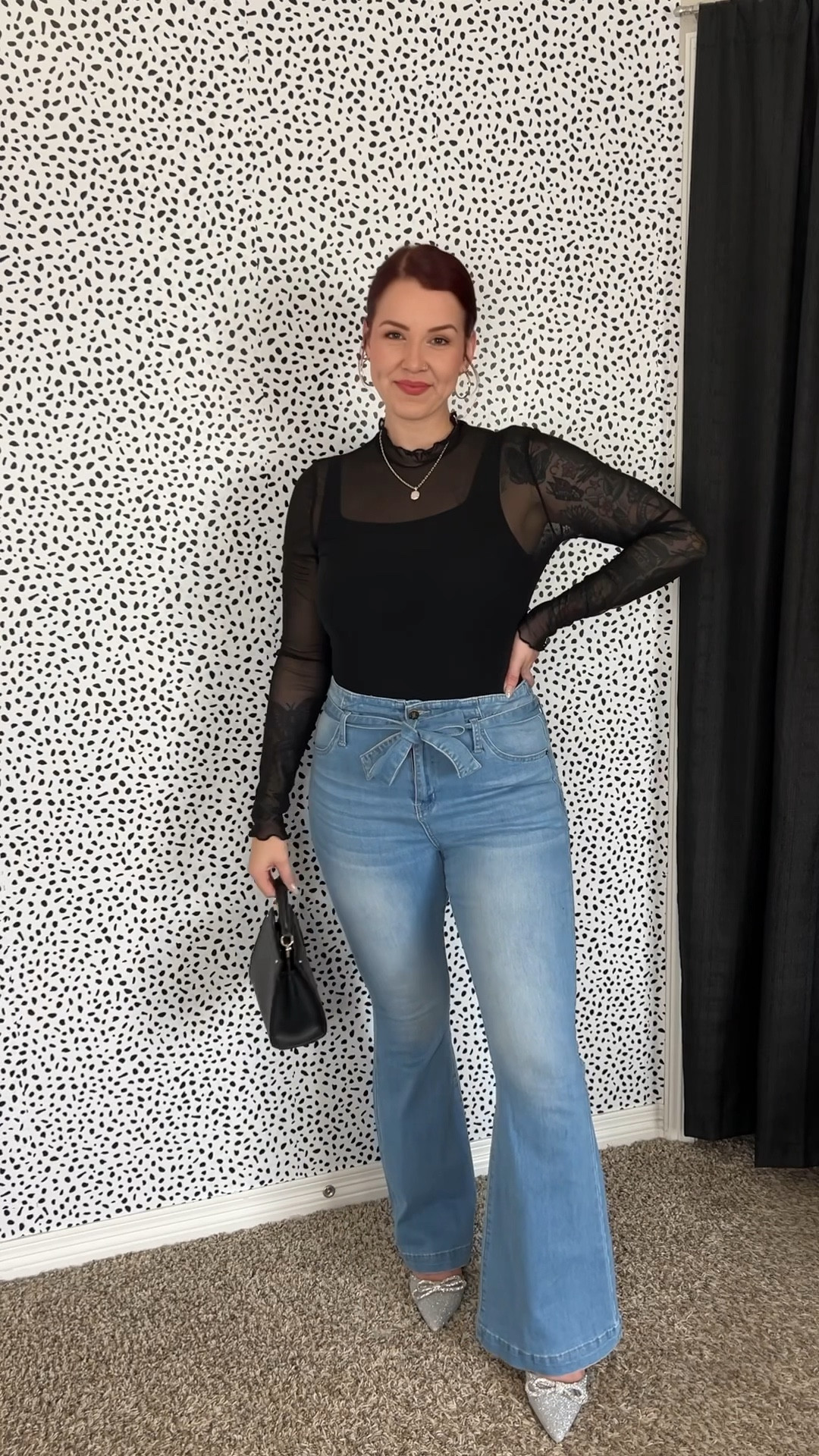 Casual girls night fit 🫶🏼🥰✨
Black sheer long sleeve ruffle shirt, size large// black bodysuit, size large// flare jeans with denim belt// size 10// rhinestone silver kitten heels and black handbag.

#LTKMidsize #LTKStyleTip #LTKFindsUnder50