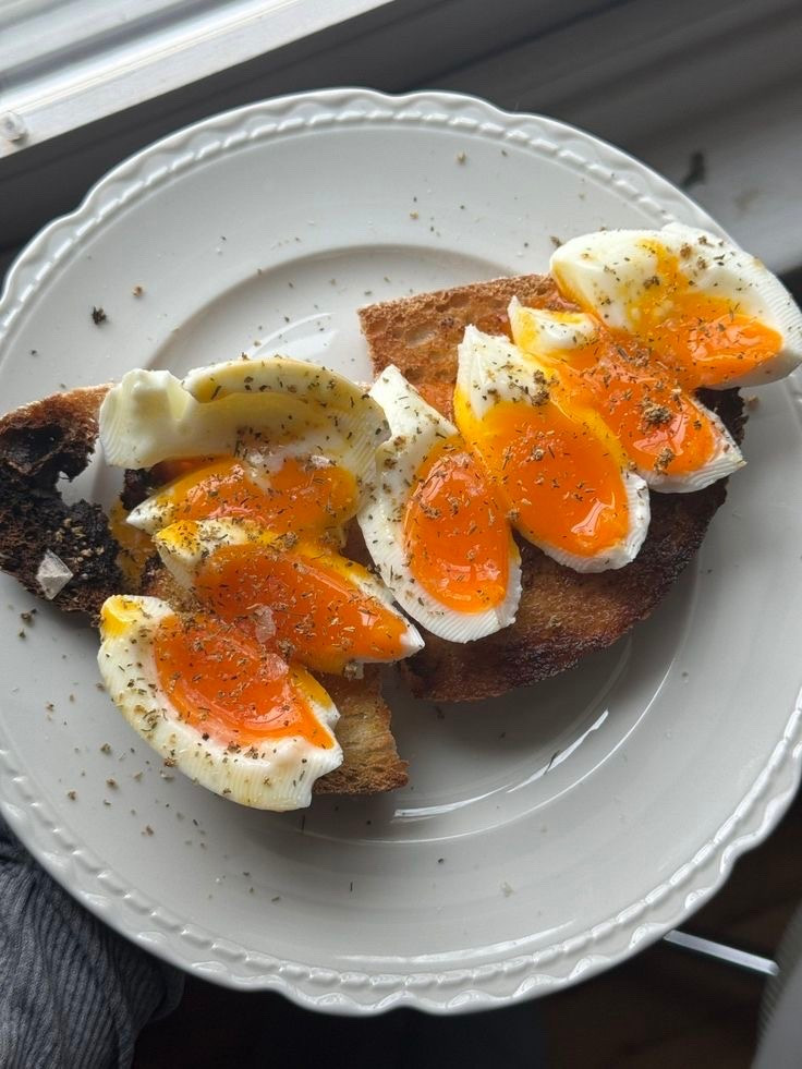 when I first tried this I was afraid the eggs would explode.... but nope, just perfectly jammy eggs every time. Add a few more minutes if you don't love the yolk as soft. I love doing this before walking the dog in the morning and coming home to breakfast made and no mess!

Instructions:
1. Air fry for 12 minutes at 300 degrees F. for perfectly hard-boiled eggs, or 10-11 minutes for a slightly softer set.
2. Immediately transfer the eggs to a large bowl of ice water to stop the cooking. Peel.

#LTKfoodie #LTKdayinmylife #LTKgrwm