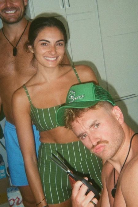 Shop Paige Desorbo's green and white pinstripe hot shorts and matching bra top #SummerHouse #paigedesirbo 

#LTKtravel #LTKswim #LTKstyletip