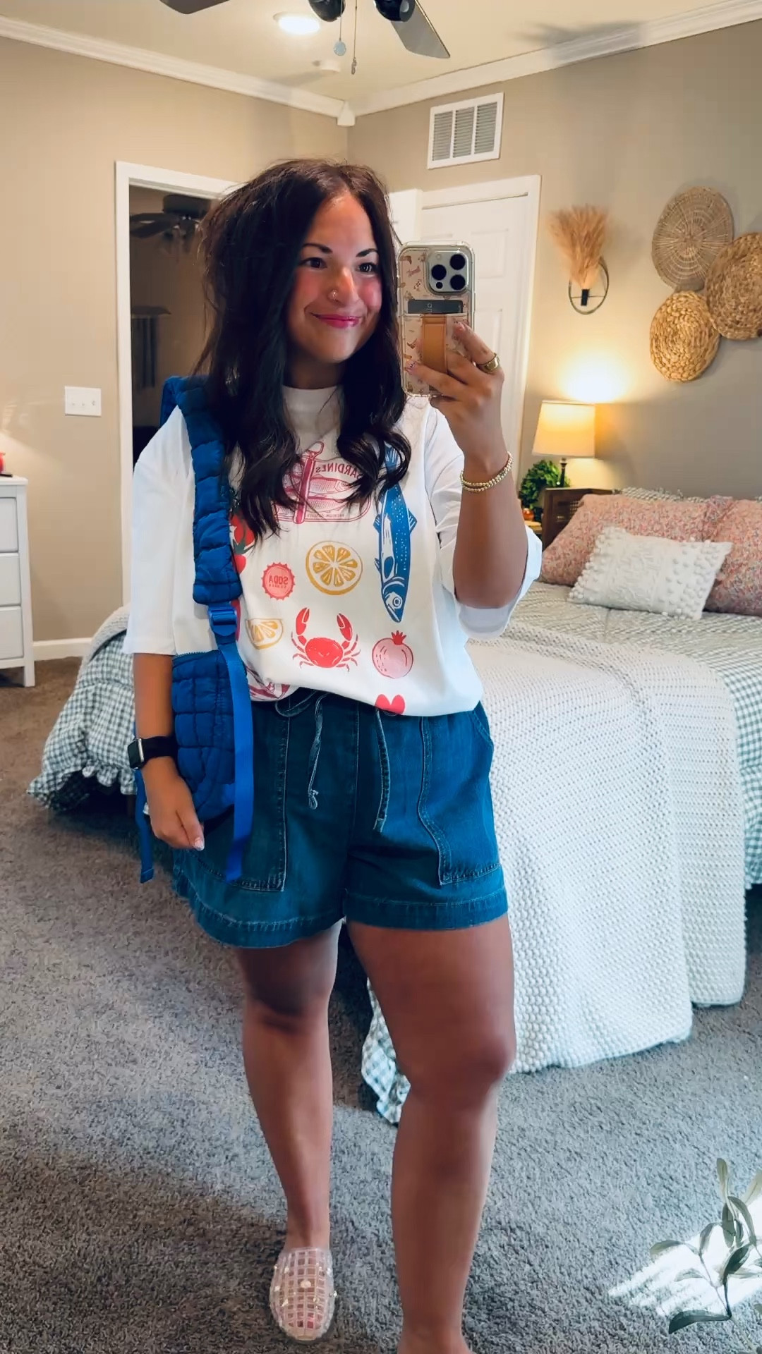 Summer uniform loading ☀️ Graphic tees + denim shorts are having a major moment right now and I’m fully on board. Easy, comfy, and effortlessly cute for everyday wear!

jelly flats: fit true to size // wearing a 5
shorts: fit true to size // wearing a large
tee: fits oversized // wearing a large
bag (from tiktok shop) linked here: https://www.tiktok.com/t/ZP9j5LenALknv-l8SG8/ 

 #LTKootd #LTKMidsize