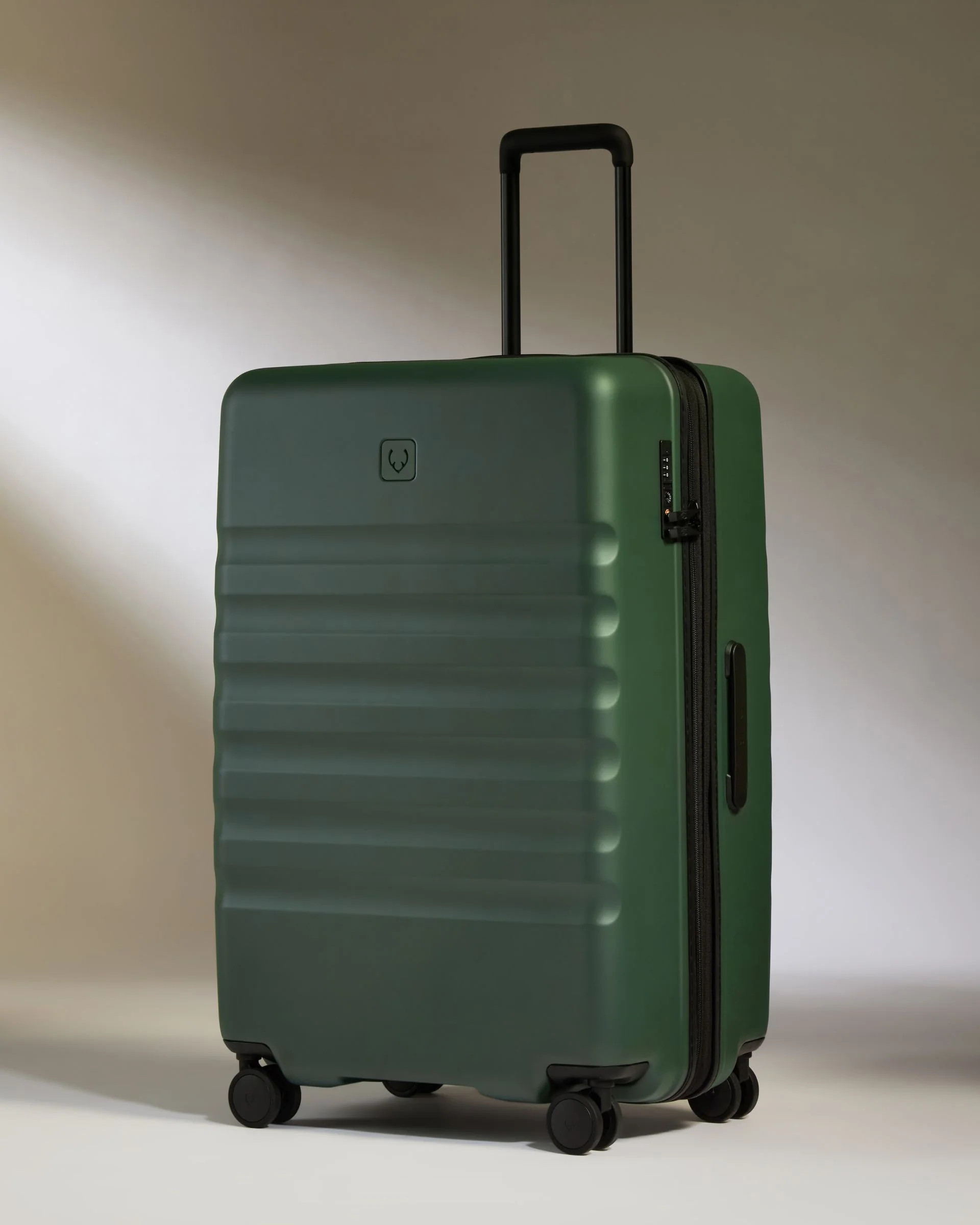Large Suitcase in Green - Icon Stripe | Lightweight & Hard Shell Suitcase | Antler USA