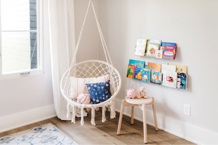 The sweetest little reading corner

#readingnook #readingcorner #bookshelves #acrylicdecor #acrylicshelves #chairswing #bedroomswing #piggybank #ruggable #girlsbedroom #toddlerbedroom 

#LTKunder50 #LTKkids #LTKhome