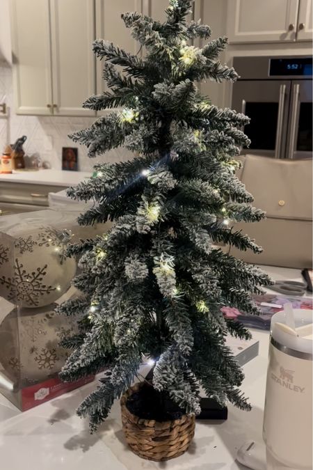 Mini Christmas tree, christmas tree for kitchen island, target tree, mini lights, twinkling lights, flocked tree 

#LTKHoliday #LTKSeasonal #LTKunder50