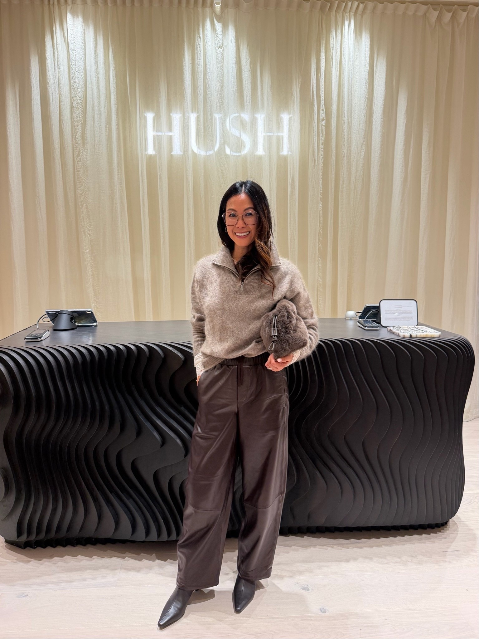 Wearing SM in half zip, size 8 in leather trousers