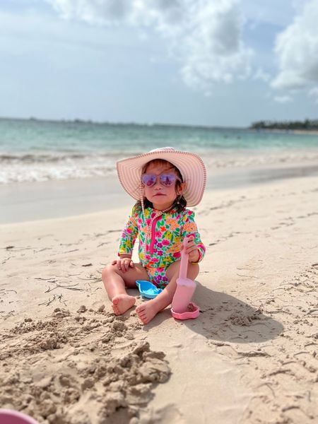 Her first time at the beach! Linked her swimsuit, beach hat, sunglasses, and beach toys!

#LTKbaby #LTKswim #LTKSeasonal
