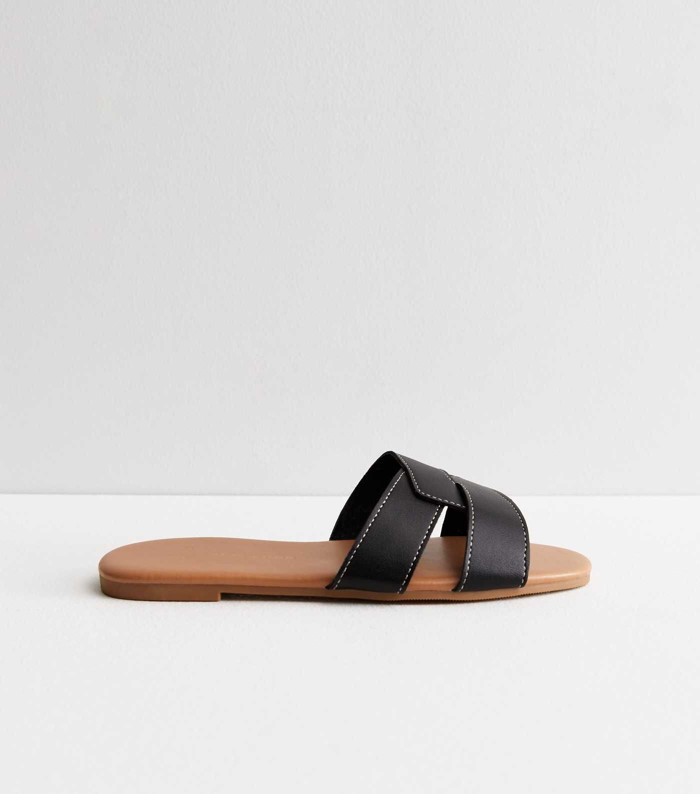 Wide Fit Black Leather-Look Stitch Sliders
						
						Add to Saved Items
						Remove from Save... | New Look (UK)