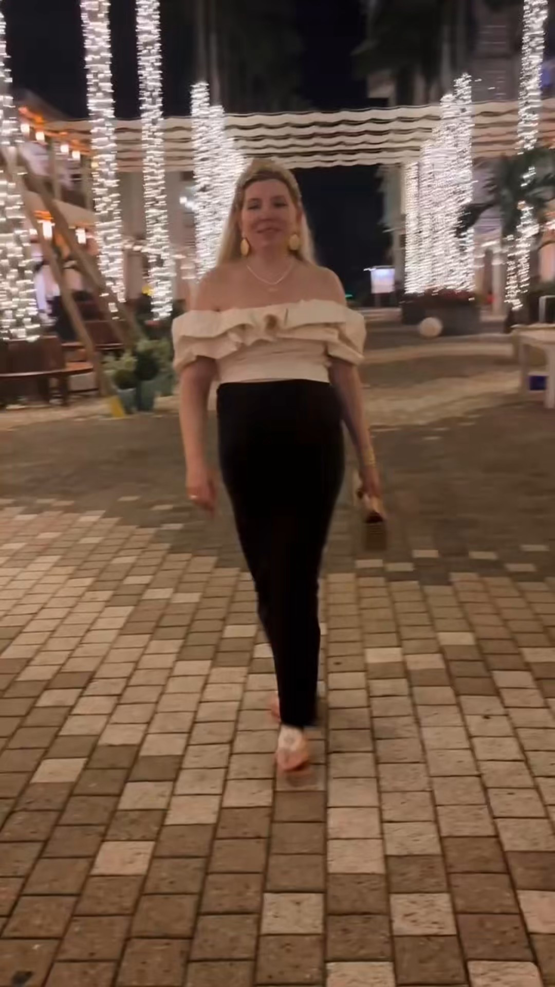 Look 2
Vaycayman 2025  🌴 Recap 🌴 

First night out on the island ✨

The moment I dropped my bags Lisa gave me the grand tour of our hotel and suite then we immediately shifted into full vacation mode. I’d been looking forward to this outfit since I packed it. It’s built on one of my favorite maternity styling tricks: high-waisted maternity bottoms paired with a regular crop top. I’m not always about that crop top life, but this silhouette became a go-to during pregnancy and because it was so comfy and such a unique silhouette.

The skirt was a Nuuly rental that turned into one of my most-worn maternity pieces. I loved it so much I bought it and it actually still works beautifully postpartum. Truly one of my best buys of the year.

We had a general idea of the area we wanted to cruise for dinner, but no set plan, so we wandered out to see what caught our eye. The wandering lasted longer than expected because I apparently don’t understand maps and I’m known for navigating based on vibes. 

The ocean air here smells unlike anywhere else and stepping outside instantly transported me back to my first trip decades ago with my parents. On our short walk to dinner, that nostalgic scent lingered in the warm air, and I felt so grateful to be back.

We ended up pivoting from our original restaurant (once we actually found it lol) to the spot right next door, and it turned out to be the perfect choice: friendly service, beautifully presented plates, and exactly the easy, delicious first night we needed to kick off our trip.

Outfit linked on LTK, as always!

#GrandCayman  #ResortStyle #VacationOutfits #WhatToWearOnVacation #PackingForParadise #BestFriendTrip #TravelStyleInspo #ResortFashion #IslandStyle #LTKtravel #LTKresort #TravelCapsule #TravelWardrobe #IslandEscape #Nuuly #MaternityStyle #MaternityOutfitIdeas #MaternityTravelStyle #MaternityCapsuleWardrobe #PostpartumStyle

#LTKBump #LTKShoeCrush #LTKTravel