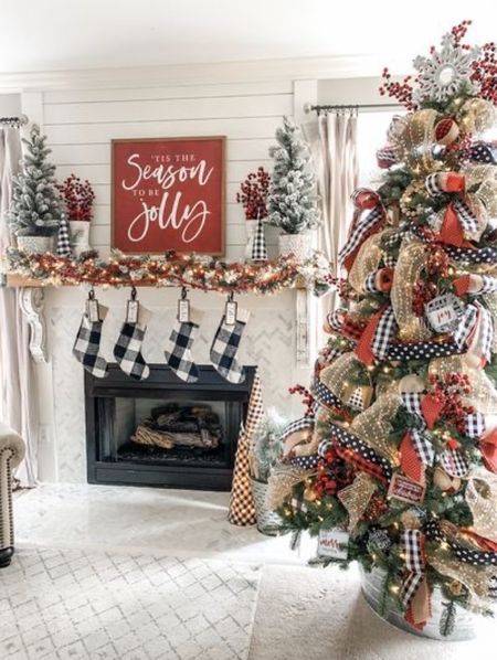 Flocked Christmas tree. Mini flocked Christmas trees. Christmas sign. Christmas mantle decor. Buffalo plaid Christmas stockings. #christmastreeribbons #christmasdecor #farmhousechristmasdecor #farmhousechristmastree #tistheseasontobejollywallart #christmasstockings #christmastreecollar 

#LTKHoliday #LTKhome #LTKSeasonal