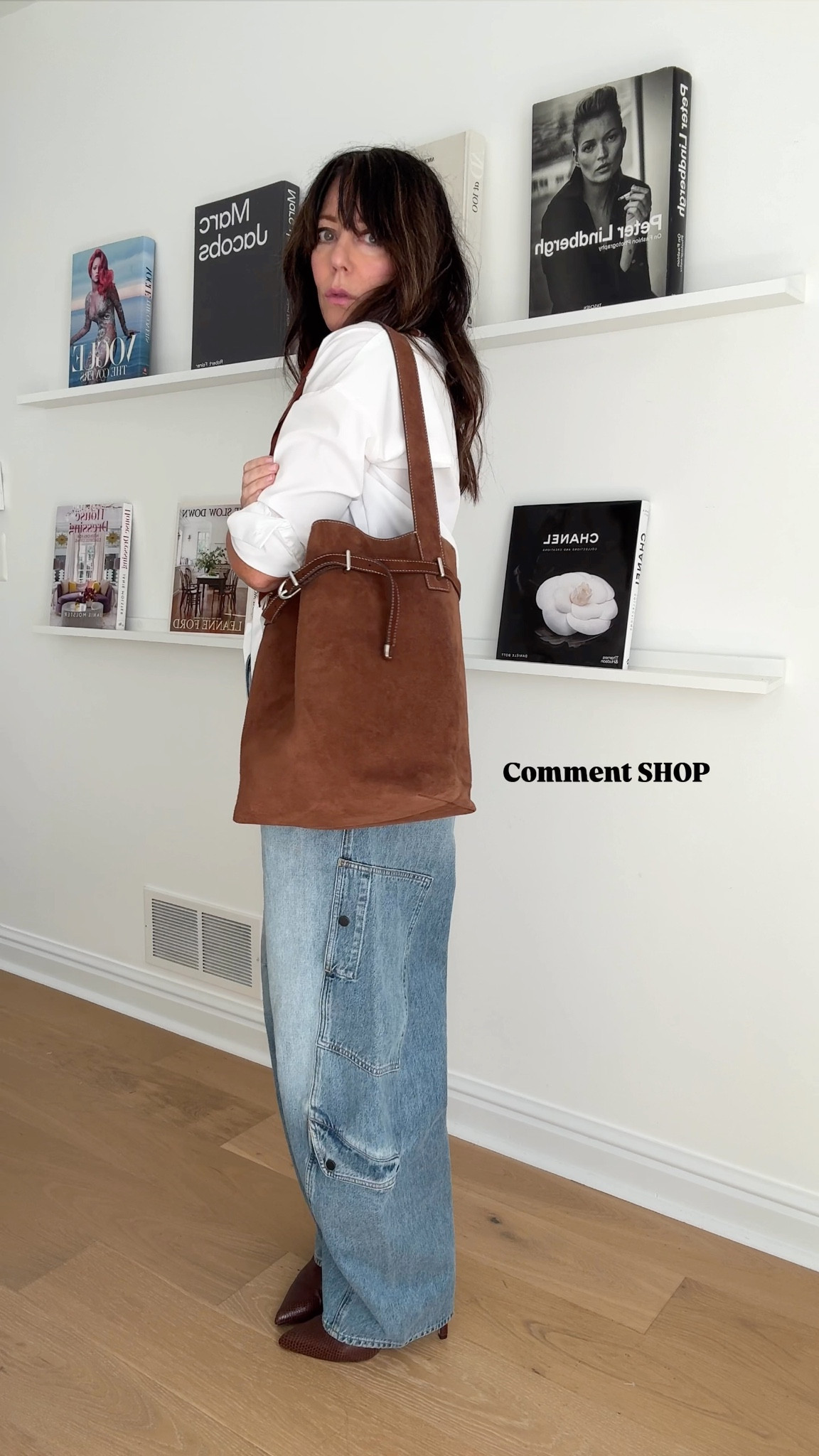 I stumbled on a cute way to “tuck in” a shirt! Will you try this? 
Love my flight jeans - run tts 
Wearing small in the non wrinkle
White shirt. Boots are so comfortable! And top it off with a great scarf that matches my suede belt bag! 

#LTKFindsUnder50 #LTKTravel #LTKParties