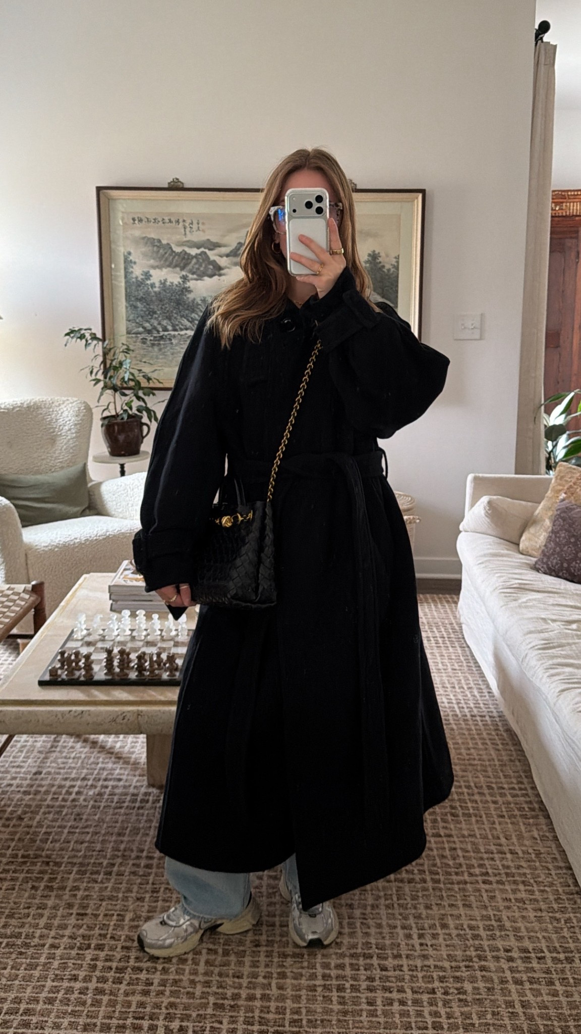 1/6/26 Casual winter outfit on repeat 🤍 wearing my Nike sneakers with Levi baggy jeans, a green sweater from Anthropologie, and a black wool coat (size small). Finished with my Bottega bag and Amazon blue light glasses. Everything I can link is here.

#LTKgrwm #LTKSeasonal #LTKootd