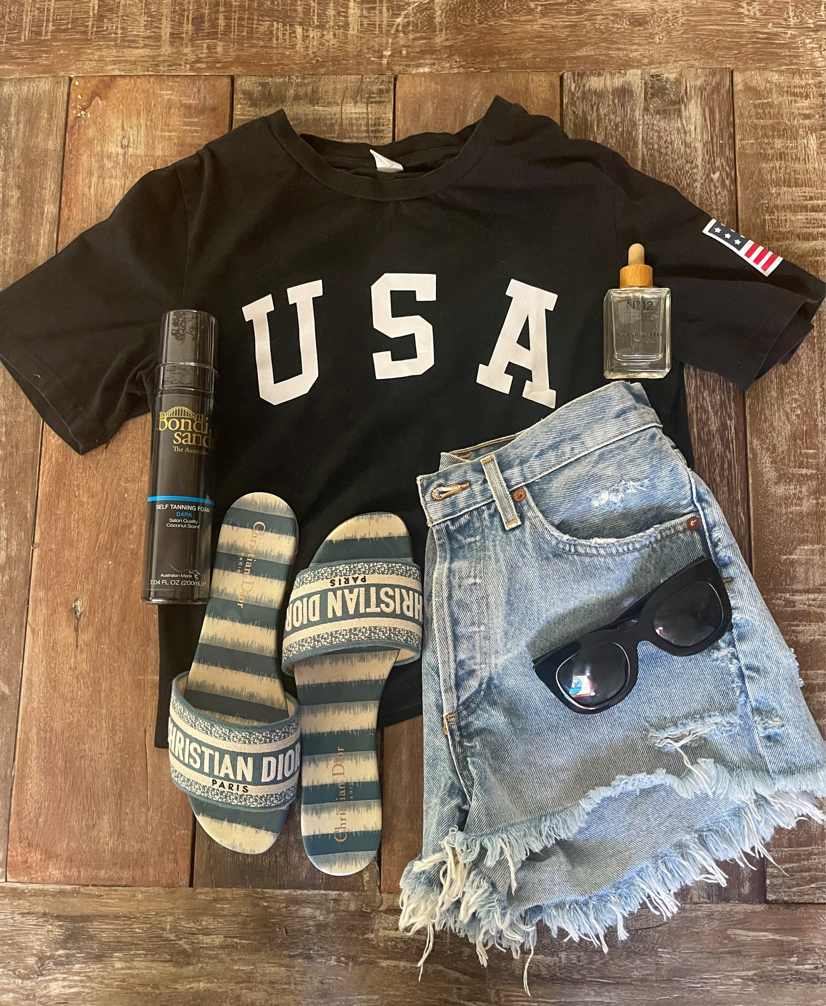 Memorial Day outfit. 4th of July outfit. USA shirt. Patriotic top. Red white and blue. Summer outfit. Casual Memorial Day outfit. Casual 4th of July outfit. Agolde denim shorts. Celine sunglasses. Christian Dior slides. Best self tanner sensitive skin. Best unscented face tanning drops. Amazon tan drops. Amazon faux tanning. Amazon self tanner. Nordstrom finds. Amazon fashion. Amazon Shirt. Shopbop finds. Shopbop fashion essentials. ❤️🤍💙🇺🇸 

#LTKFind #LTKbeauty #LTKstyletip