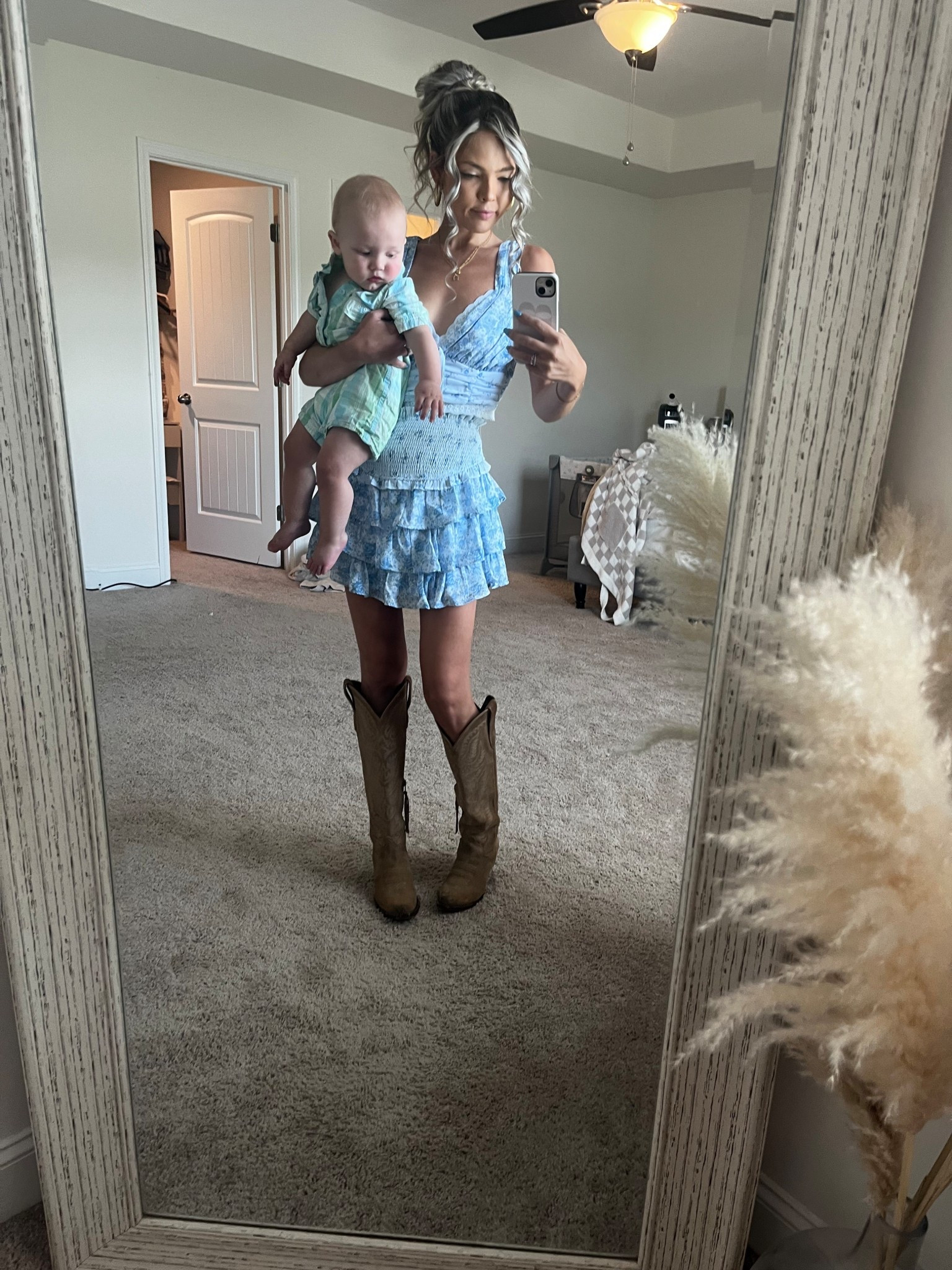 Perfect for a day wrangling the tiny tornado and still looking like you just stepped off a runway 🤠✨ Frills, boots, and baby’s mini PFG — because mom life deserves a little glam and grit. 👢💕

#LTKFamily #LTKBaby