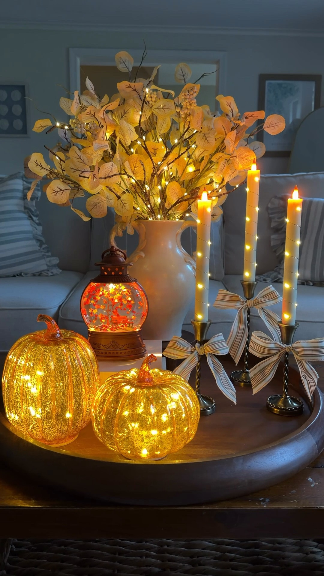 As it gets darker a little bit earlier I can’t help but be excited to have warm twinkly lights back! I loved putting this centerpiece together because it looks just as great during the day as it does at night! These light up twigs are an absolute staple for me, I use them now through Christmas and they elevate any arrangement! The fall snow globe and mercury glass pumpkins are the perfect complements to welcome back brisk, fall nights 🍂

#LTKSeasonal #LTKHome