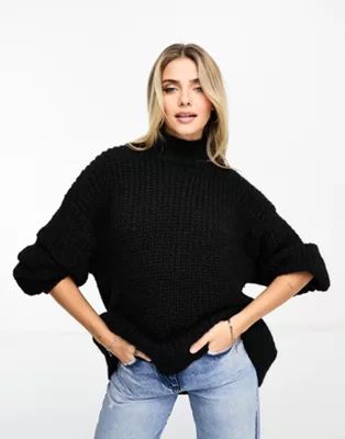 Monki high neck chunky rib knitted jumper with volume sleeve in black | ASOS (Global)