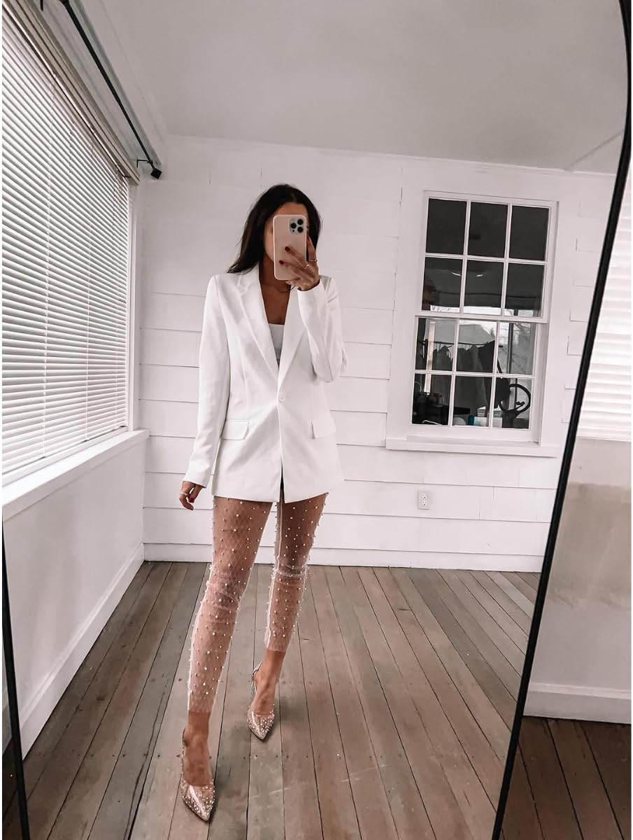 New Years eve outfit✨Blazer - runs big, size down one wearing XXS, heels true to size, tanks wearing size S. Wearing leather shorts under (size S). And pearl beaded tights linked!
 

 #LTKHoliday #LTKPetite #LTKFindsUnder100