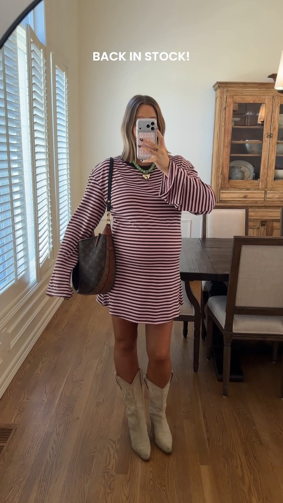Dress restocked 💓💓size 10 I’m 5’ 5” and it’s such a perfect length!! If I wasn’t pregnant I would do an 8. Stick with true size. Boots true to size probably my most worn cowboy boots ever!! Amazon necklace for a pop of color 

#pregnancystyle #bumpstyle #stripeddress #bresheppard #princesspolly #nordstrom