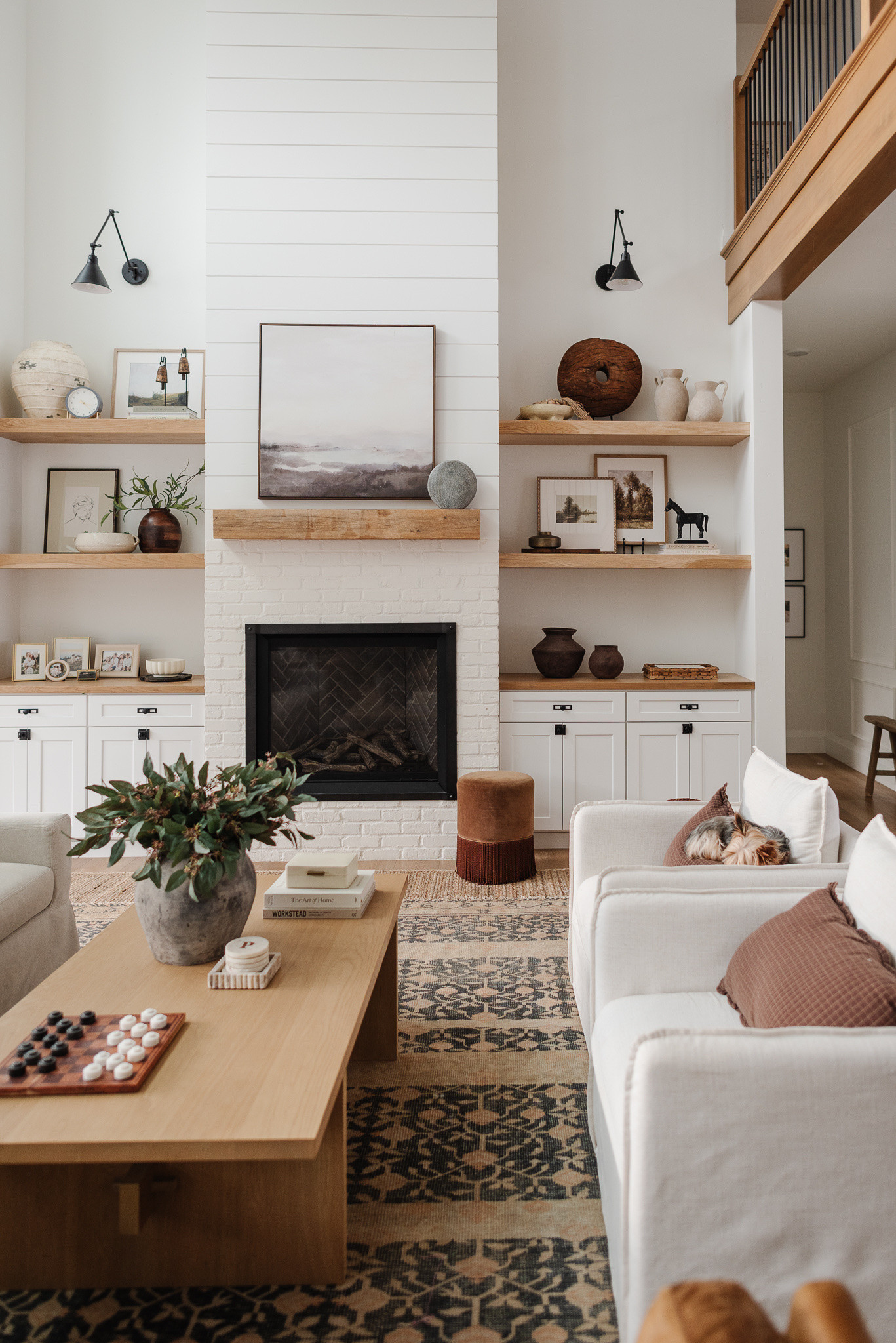 Living room views! Living room, open shelves, living room decor, accent chairs, coffee table, shelf decor, classic home, McGee and co

#LTKHome
