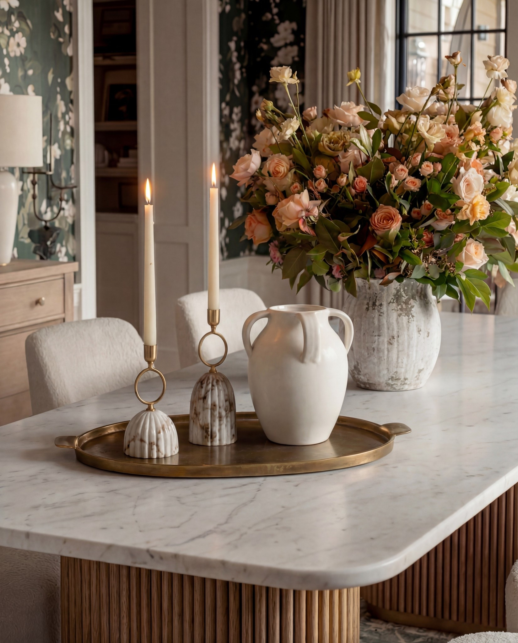 Shop the Look:
• Deep green floral wallpaper
• Marble-top dining table with fluted wood base
• Curved boucle dining chairs with brass base detail
• Light oak 6-drawer sideboard
• Matte white ceramic table lamp
• Oversized floral art in a brass frame
• Textured stone + ivory ceramic vases
• Sculptural brass decorative bowl
• Modern brass + globe chandelier
• Green vintage-style rug with cream + sage tones

#LTKHome #LTKSaleAlert #LTKCyberWeek