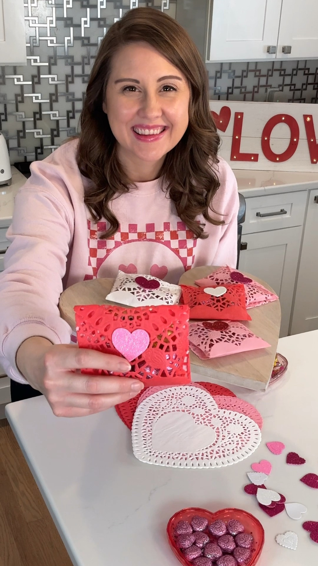 ❤️✂️💌 Creating the cutest little lace envelopes for Valentine’s Day using heart doilies! ✨ With just a few simple folds, you can make these delicate pouches perfect for holding little treats. 🍬🥰 Seal them closed with a heart-shaped foam sticker ❤️ for an extra special touch! These DIYs are super easy and make adorable gifts for classmates, friends, or party favors. Spread the love with these charming handmade goodies! ❤️💖💕

#ValentinesDayDIY #HeartDoilies #DIYValentines #CraftyMom #ValentineFavors #EasyCrafts #HandmadeWithLove #ValentinesDayIdeas #KidsCrafts

#LTKFamily #LTKKids #LTKSeasonal
