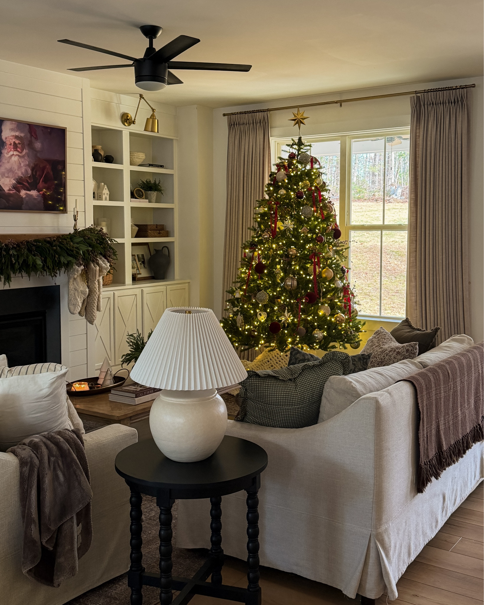 Finally getting around to sharing our Christmas tree! I got it done a few weeks ago but my girls have been moving ornaments around non stop. My oldest is really into decorating and has been stealing my ornaments for her tree as well. 🤣  

Anyway, here are some pictures of my living room all dressed up for Christmas! 

#LTKHome #LTKHoliday