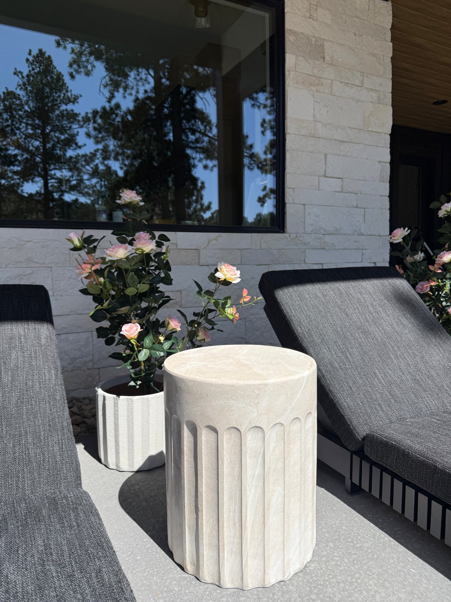#AD This faux rose plant is exactly what I needed from @Wayfair . It is 45” tall and comes in 4 different colors. I love the pink. and am using in a shaded area for outdoor use. Then this side table. It looks like stone and it doesn’t show the side fluted details in the product photo but love that detail when it was delivered. #Wayfair #WayfairPartner #outdoor #wishyouwerehere 