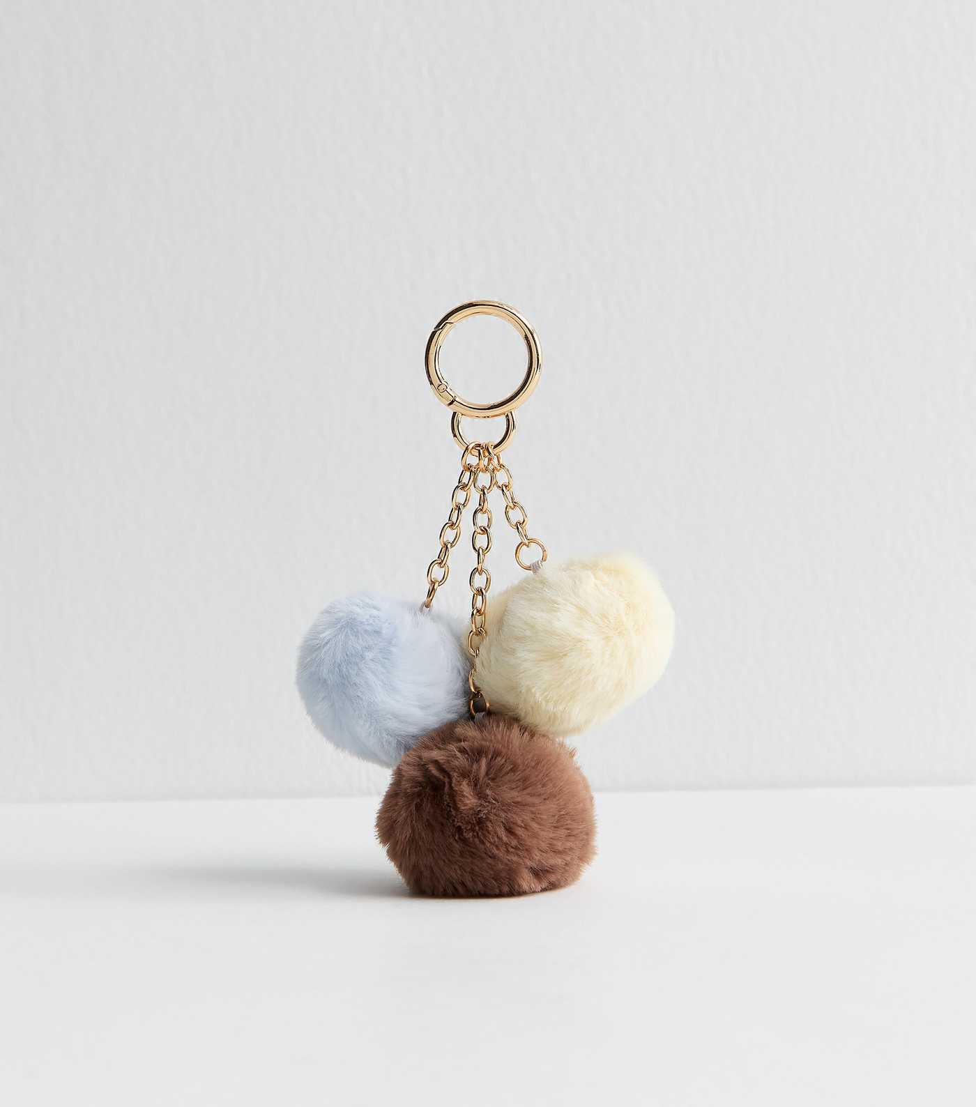 Yellow Blue and Brown Three Pom Pom Bag Charm | New Look | New Look (UK)