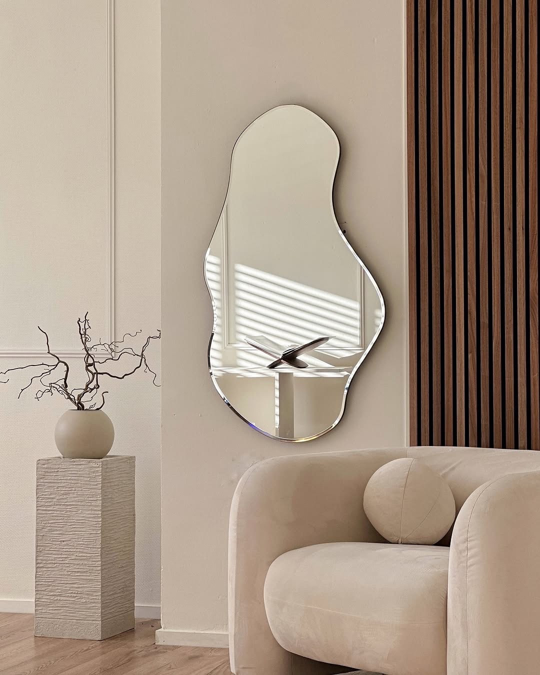 There’s something so peaceful about a space that feels intentional — and this corner has become just that for me. The fluid mirror shape adds a unique focal point, while the cozy, curved chair invites you in. I finished it off with a neutral-toned vase and natural branches for a bit of organic charm. Sharing all the details you need to recreate this look via my LTK. #InteriorDesignLover #AestheticSpaces

#LTKHome #LTKActive #LTKSeasonal