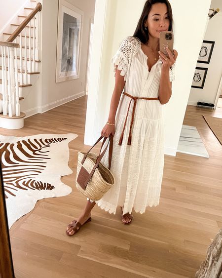 Kat Jamieson shares an old white Zimmermann dress, Loewe straw tote bag, and Hermes sandals. Classic style, summer dress, midi dress, eyelet, white dresses. 

#LTKitbag #LTKshoecrush #LTKSeasonal