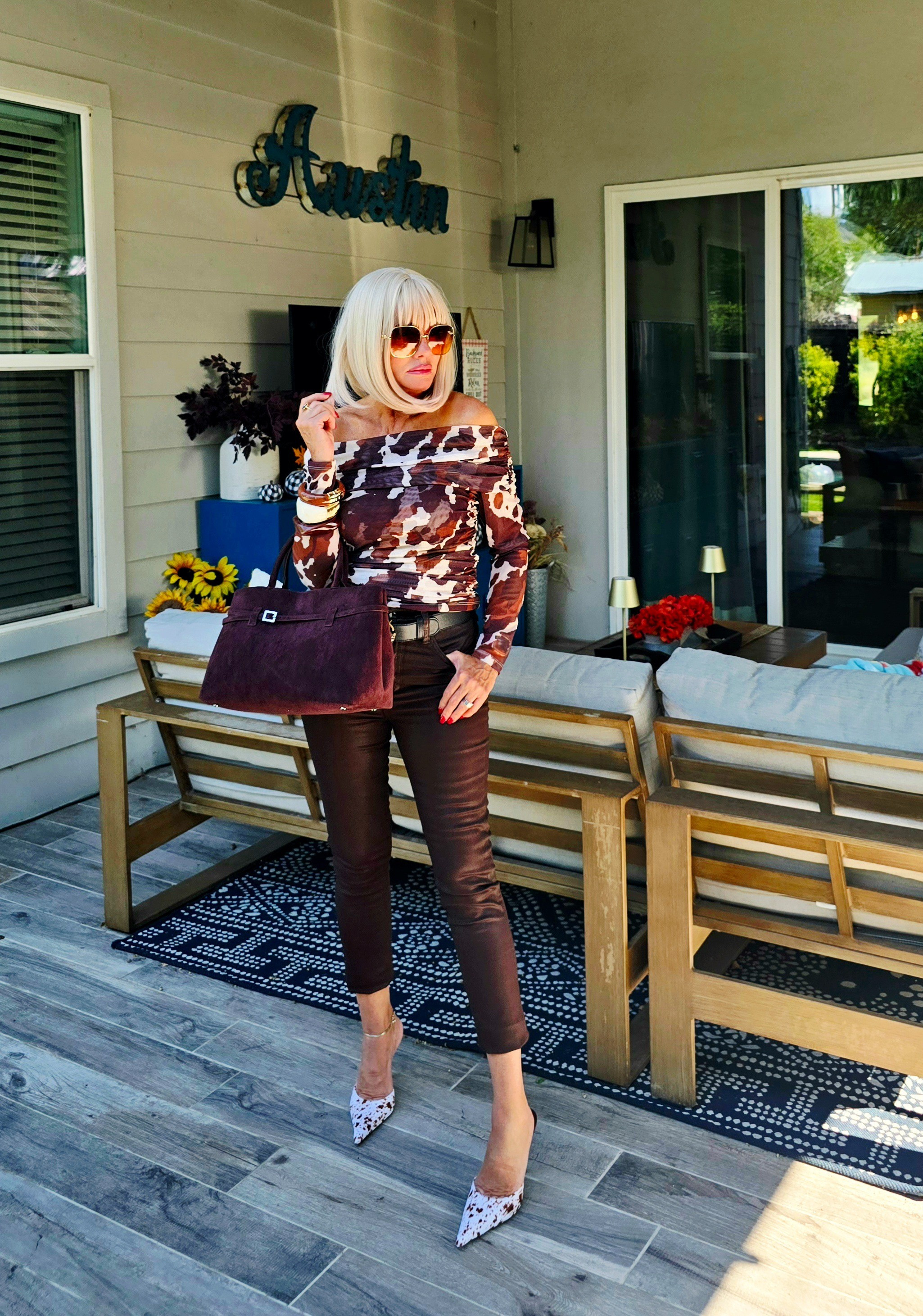 Fall style with Anthropologie Top and faux suede bag. Jeffrey Campbell ponyhair mules. 

#LTKSeasonal #LTKStyleTip #LTKShoeCrush