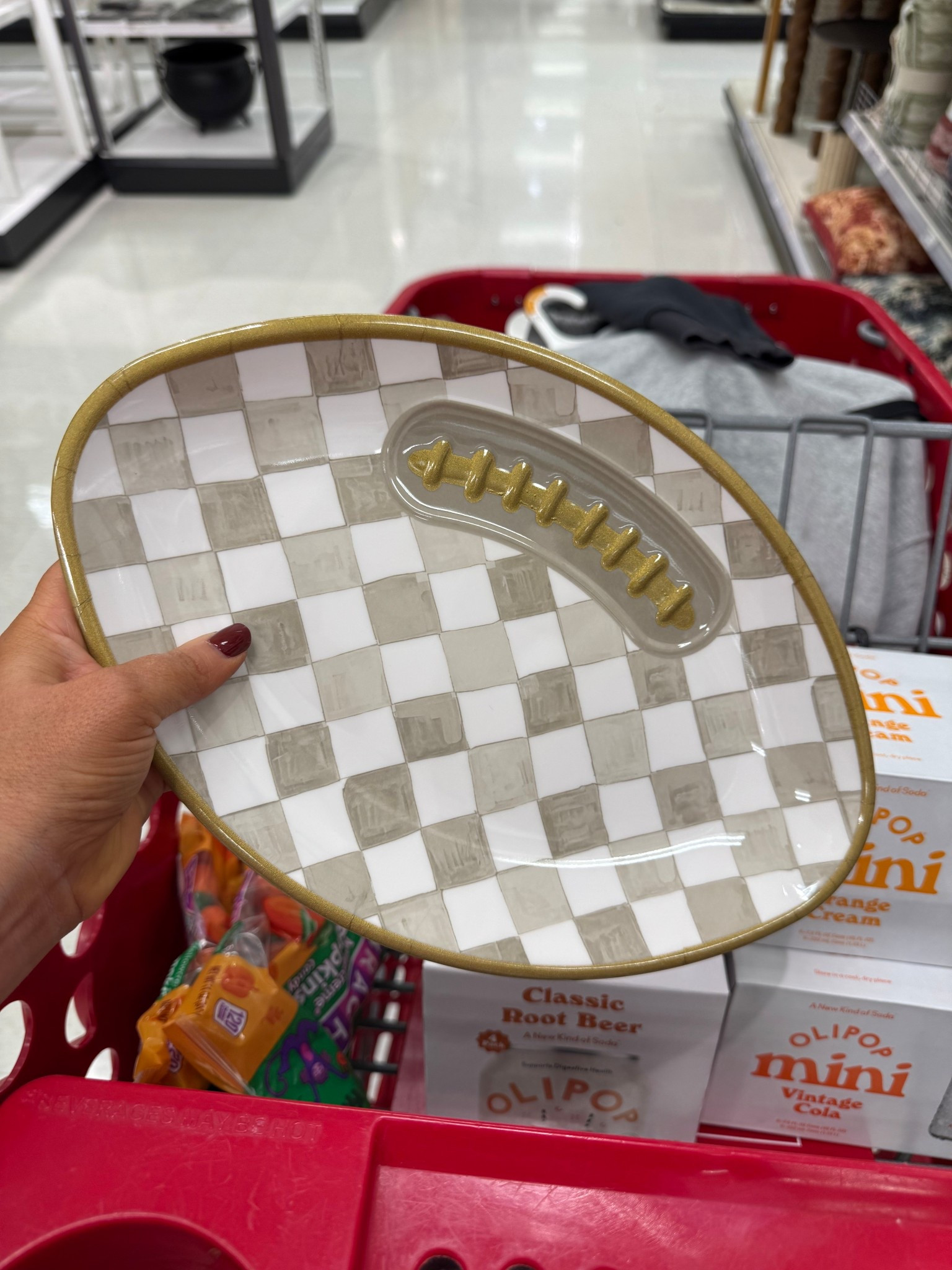 $10 checkered football plate from Target! Looks like Mackenzie Childs! 

#LTKHome #LTKSeasonal #LTKFindsUnder50