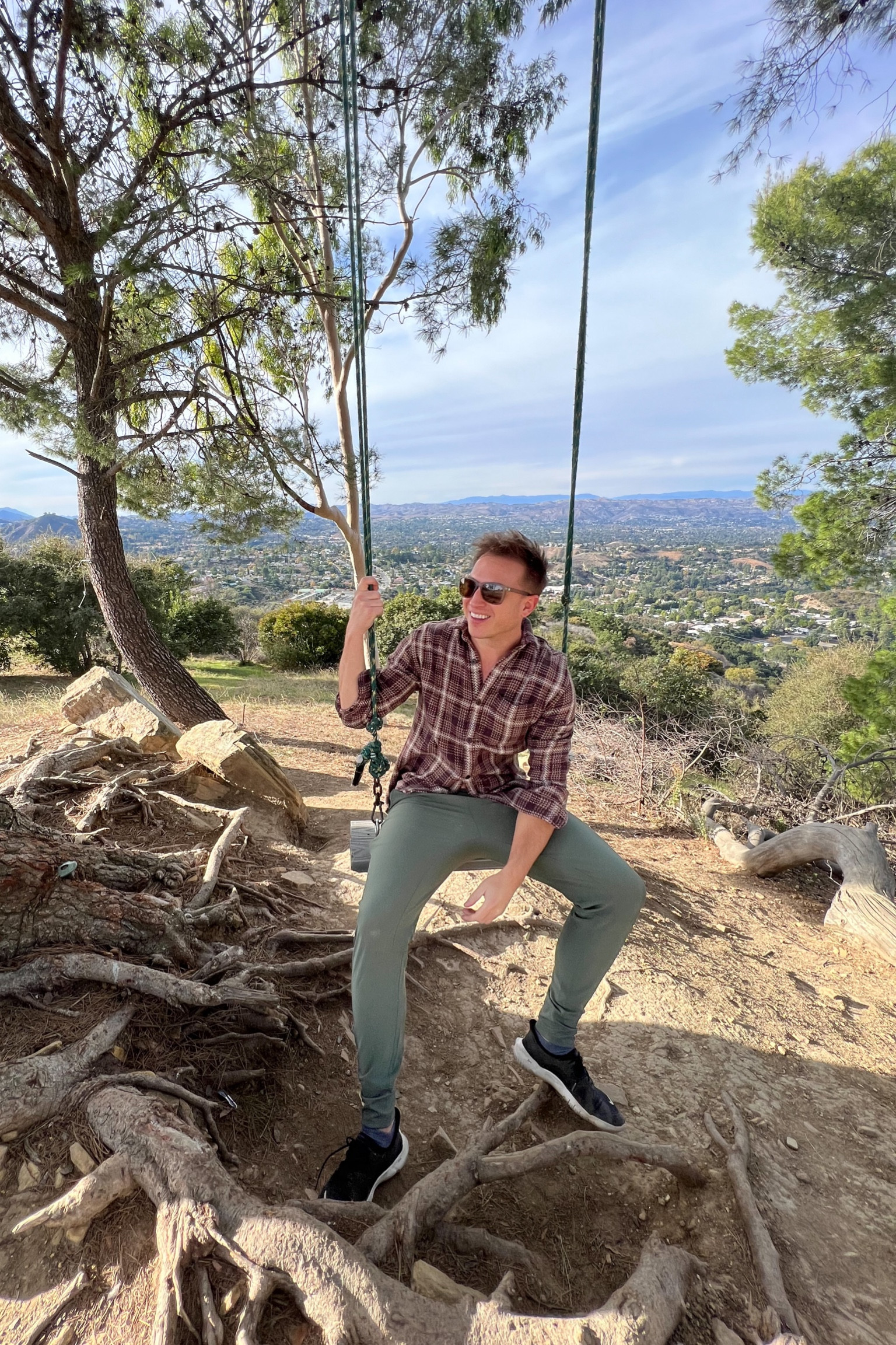 Holiday Look. Comfy trainer joggers (form fitted, stretchy) with heavy weight flannel (slightly oversized and heavier than regular flannel not quite a jacket though), Nike running shoes, Sunski sunglasses. This look is comfy casual but also has an elevated dress up look to it. Perfect for casual family holiday parties or for an outdoor venture. 5’10” size medium in shirt and pants. 

#LTKSeasonal #LTKmens #LTKfitness