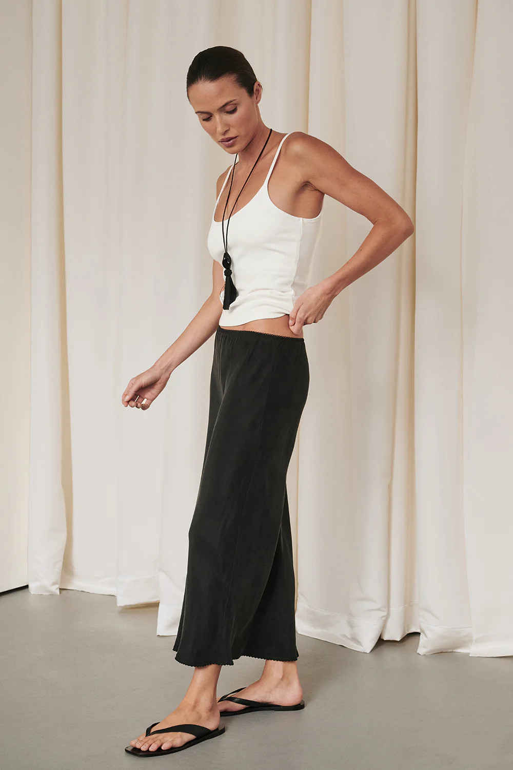 ARELIA BLACK CUPRO MIDI SKIRT | DISSH