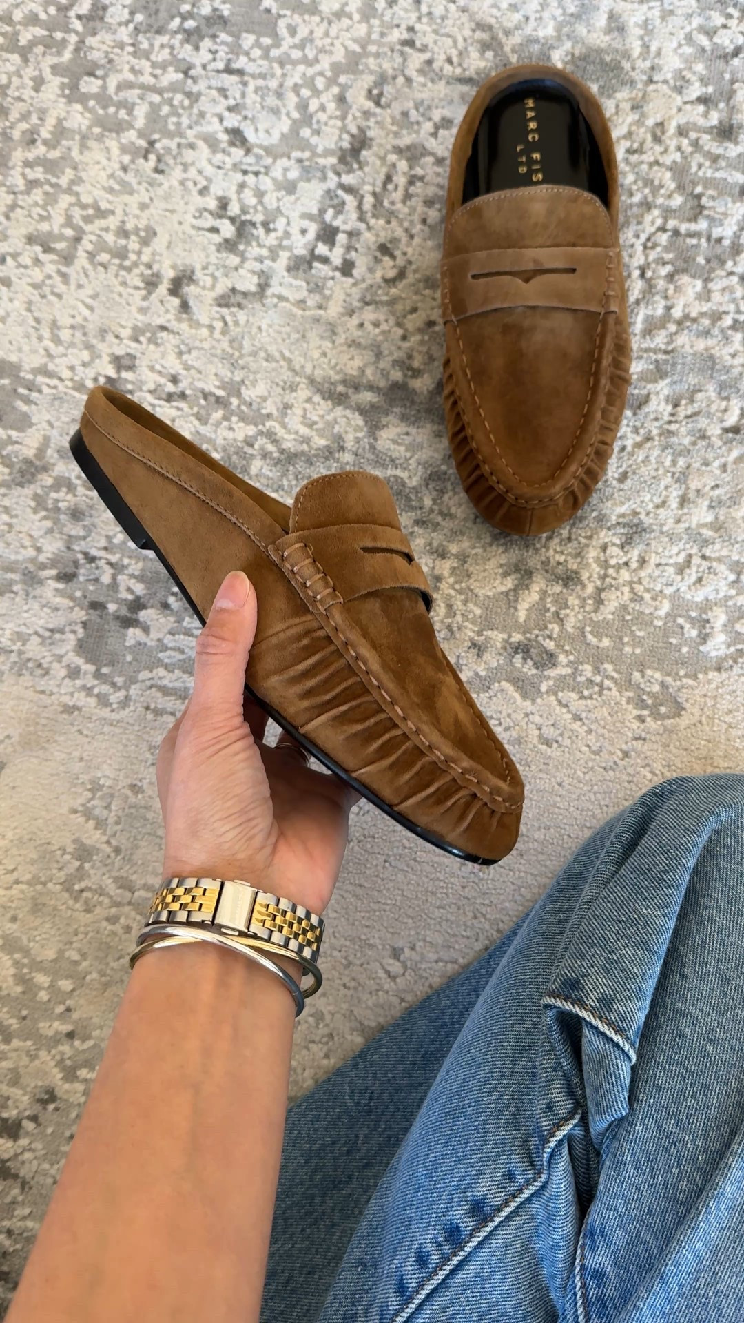 Casual chic loafer mules. Modern classic style. I’ve been wanting add a pair of loafers to my wardrobe for a while now, but couldn’t seem to find the right ones for me. Searching for more casual to wear mostly with jeans. I’m still looking to try a full loafer style, but these mules drew me in. I love ruched leather look. 
- Sizing seems true to size. I usually take a 6 in flats and that’s what I have here. If you intend to wear thicker socks, you could size up. 
- Comfy out of the box and seems to be good quality to last beyond a season. 
- These jeans are a good staple classic straight leg that also comes in ankle length. True 100% cotton denim that gets better with time. I size up in this style. 
- Classic cable knit sweater in an oversized fit. 
- Favorite staple white t-shirt as a base layer. 
- Convertible leather bag. Mid-priced luxury bag  


#LTKOver40 #LTKWorkwear