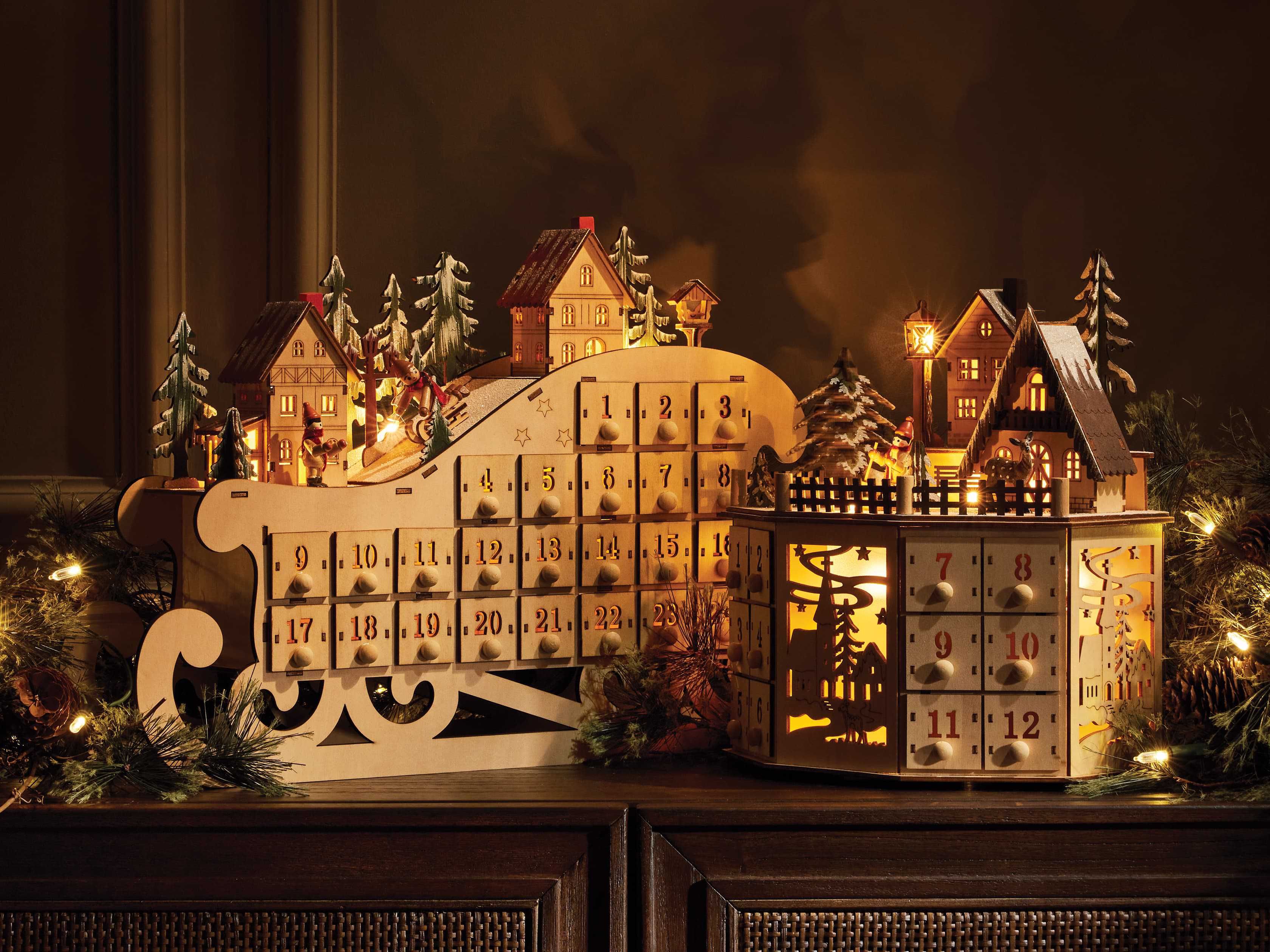 Celebrate every day this holiday season with this charming sleigh-shaped Advent calendar topped w... | Arhaus