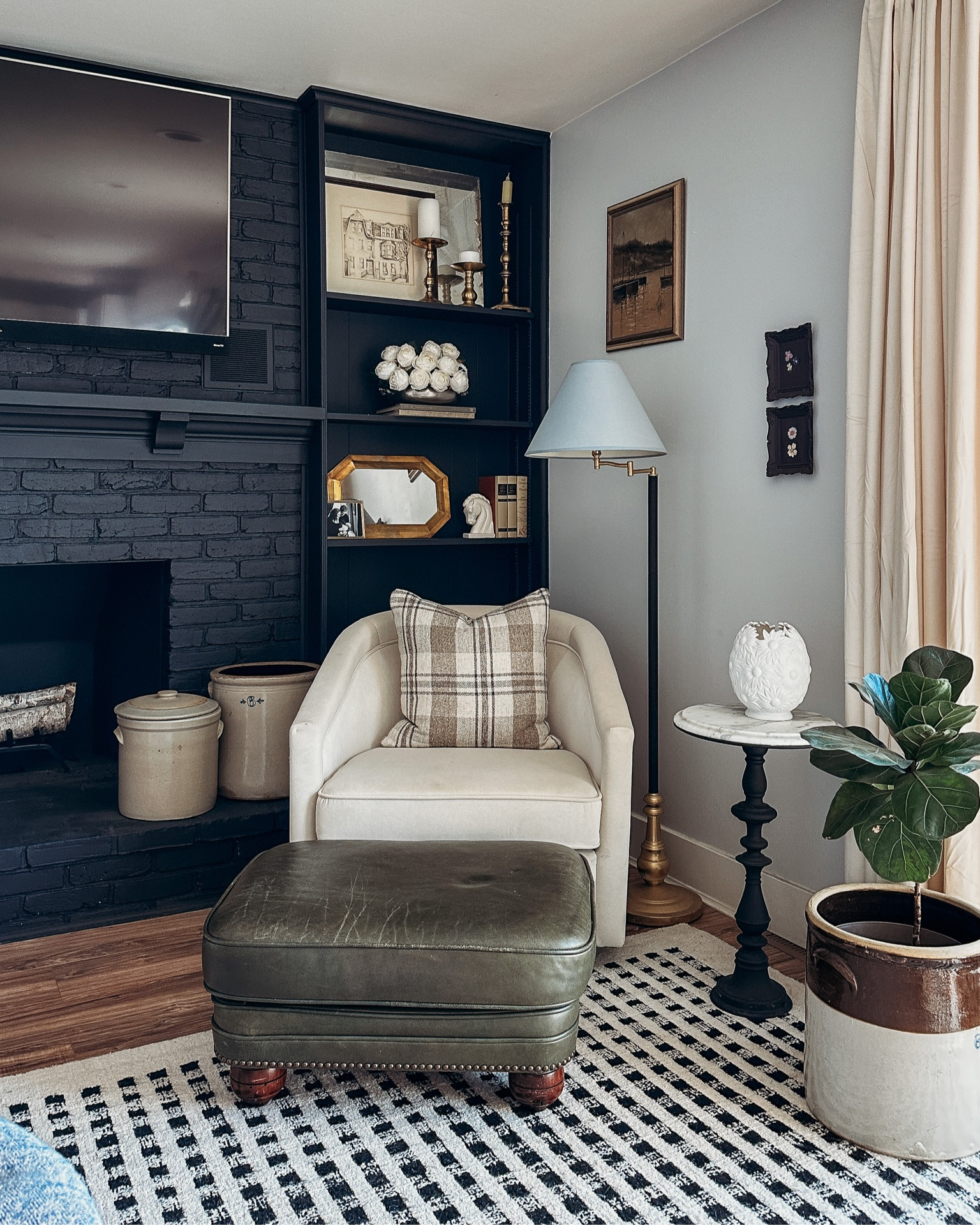 Family room rug, barrel swivel chair, crock, candlesticks 

#LTKhome #LTKsalealert #LTKFind