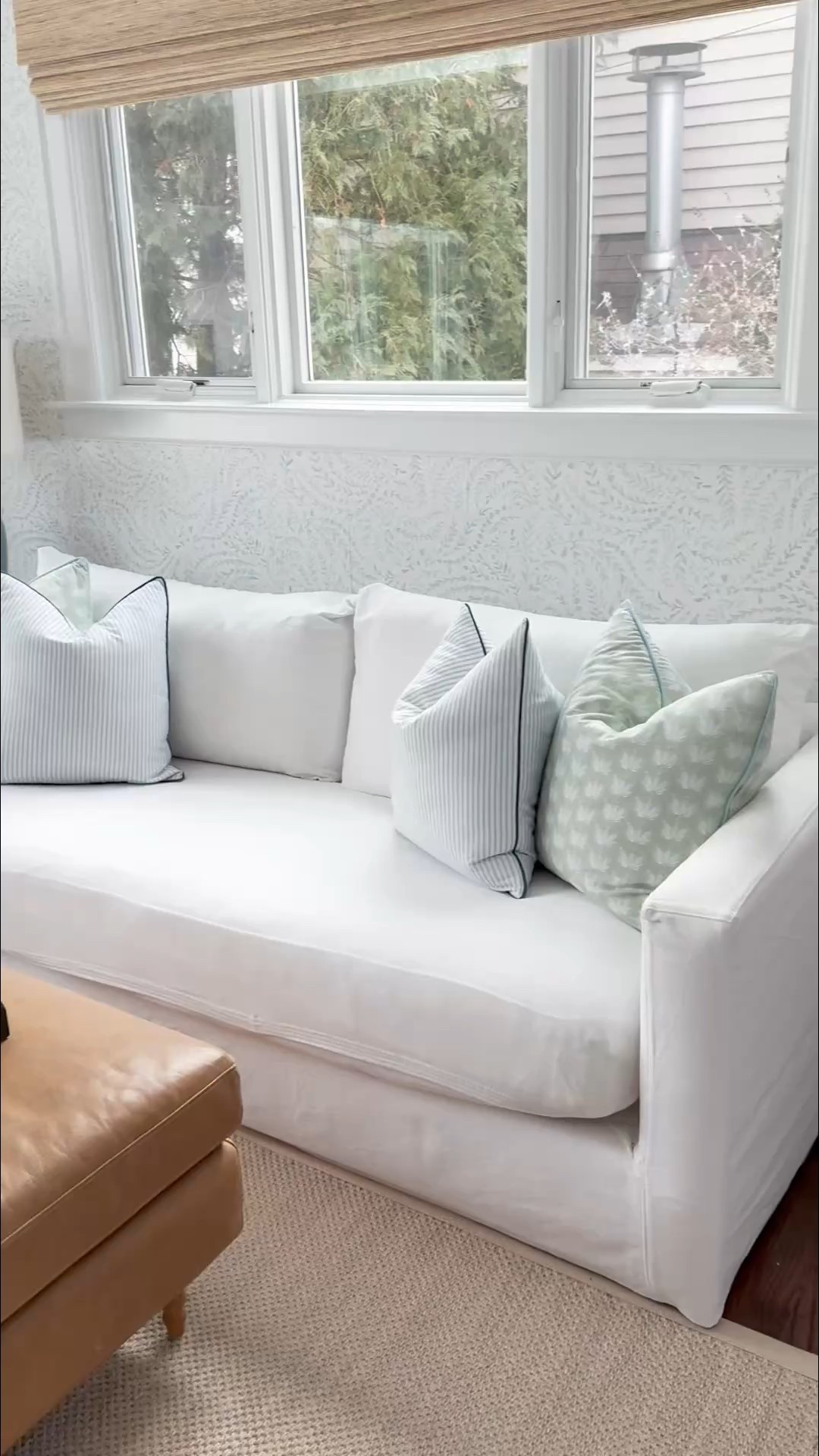 Our finished coastal inspired play room featuring a white couch, light blue swivel chairs, Serena & lily wallpaper and accents of blue, green and navy 

#LTKHome #LTKFindsUnder100