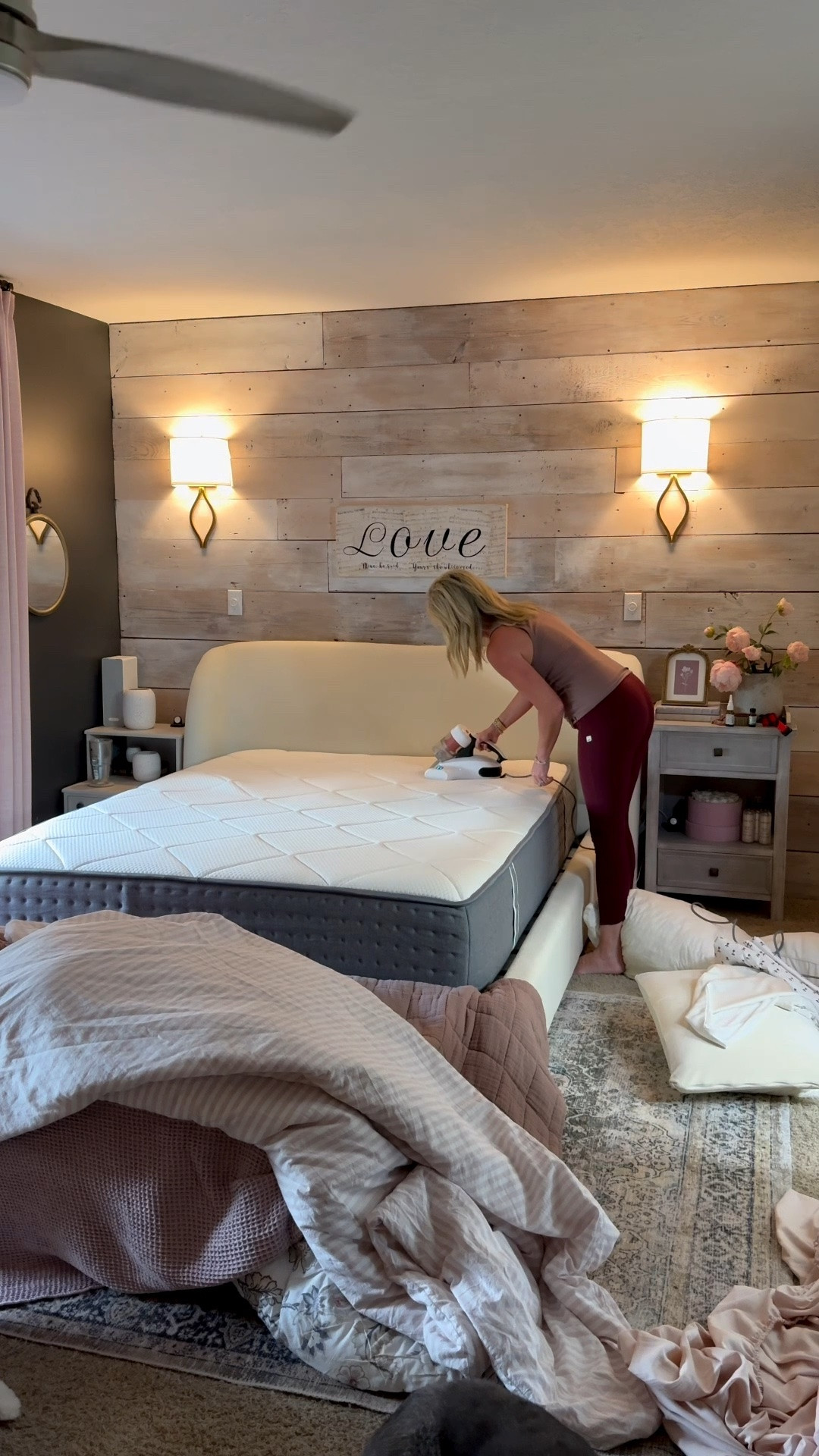 Mattress vacuum, floral sheets, pink striped duvet, floral comforter