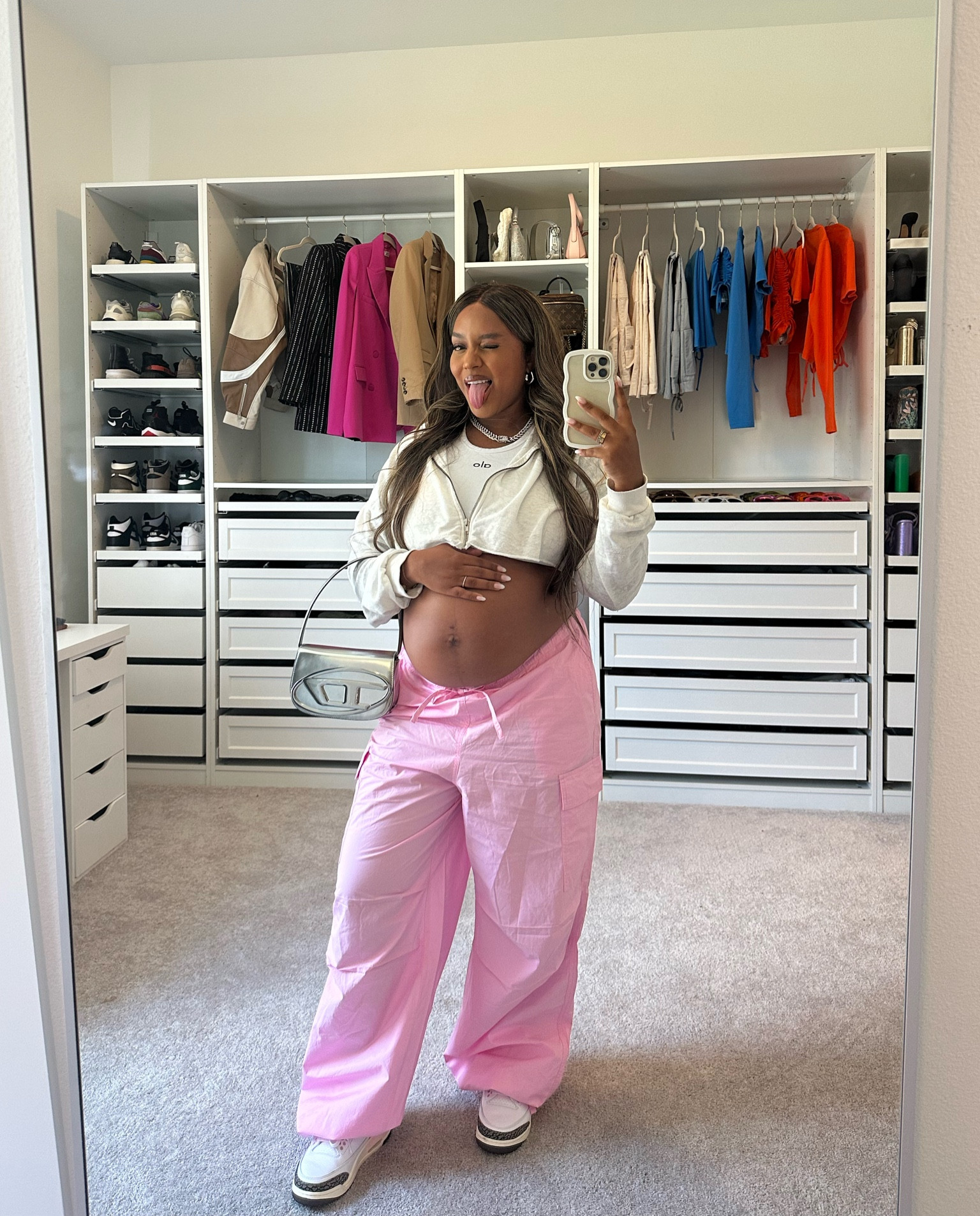 Maternity streetwear fit, cargos from target, tank top from alo, sneakers are Jordan’s. Outfit of the day, spring outfit, pregnant, bump style. 

#LTKfit #LTKcurves #LTKbump